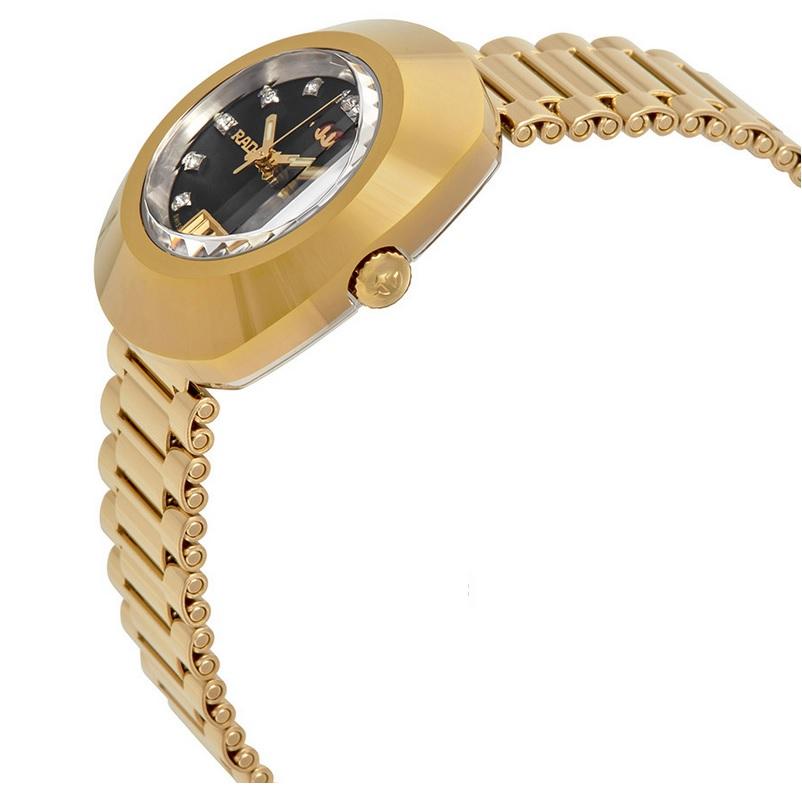 Gold PVD stainless steel case and bracelet. Fixed gold PVD bezel. Black dial with luminous gold-tone hands. Dial Type: Analog. Luminescent hands. Date display at the 6 o'clock position. Rado caliber 557 automatic movement. Scratch resistant sapphire