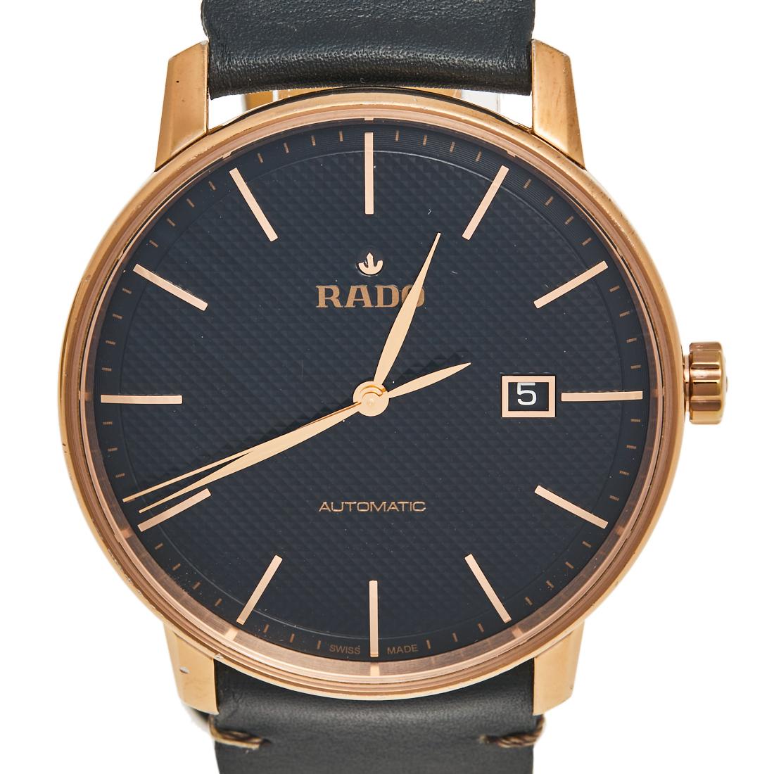 Redefine style with this exclusive Coupole wristwatch from the house of Rado. The round dial houses three hands, index hour markers, and a date window. With a water resistance of up to 50 meters, this automatic watch, made from rose gold-plated
