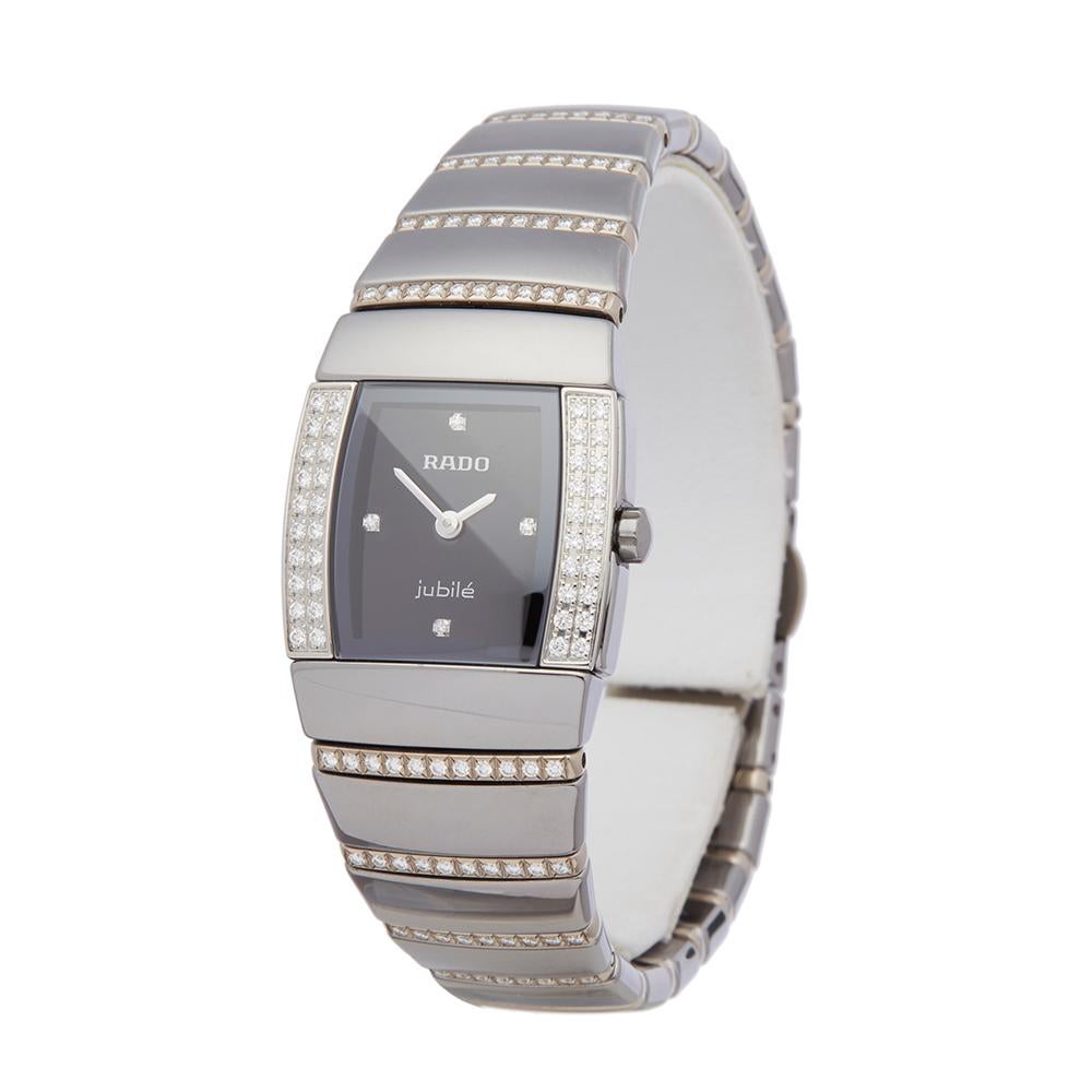 Ref: W5579
Manufacturer: Rado
Model: Sintra
Model Ref: R13578719
Age: 
Gender: Ladies
Complete With: Box, Manuals & Guarantee
Dial: Black Diamonds
Glass: Sapphire Crystal
Movement: Quartz
Water Resistance: To Manufacturers Specifications
Case: