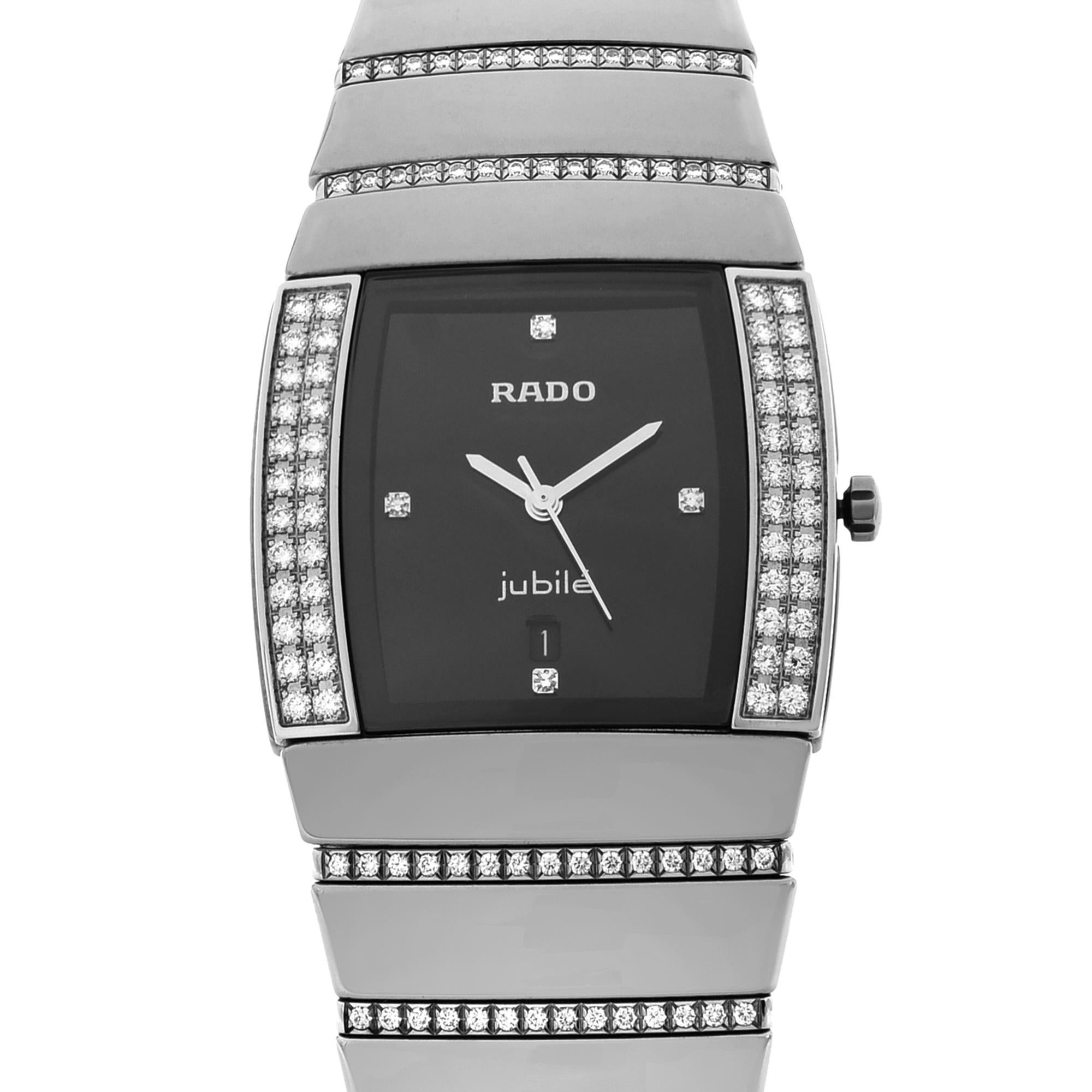 This brand new Rado Sintra R13577719 is a beautiful timepiece that is powered by a quartz movement which is cased in a ceramic case. It has a round shape face, date, and diamond dial and has hand diamonds and unspecified style markers. It is