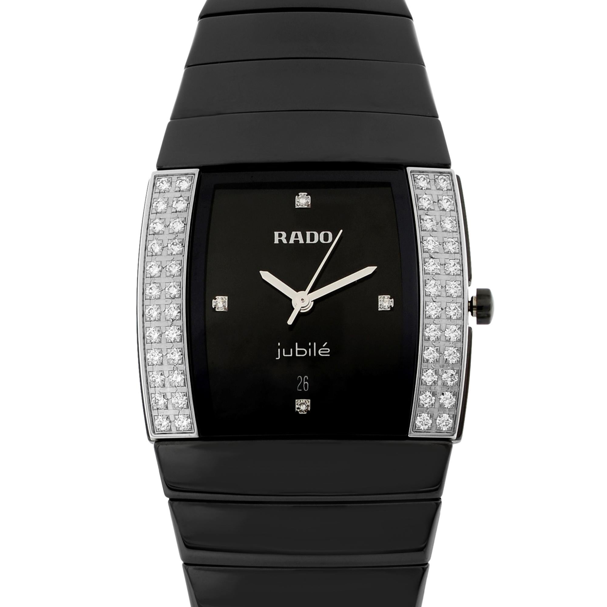 This brand new Rado Sintra R13617712 is a beautiful Ladies timepiece that is powered by a quartz movement which is cased in a ceramic case. It has a  rectangle shape face, date, diamonds dial, and has hand diamonds, unspecified style markers. It is