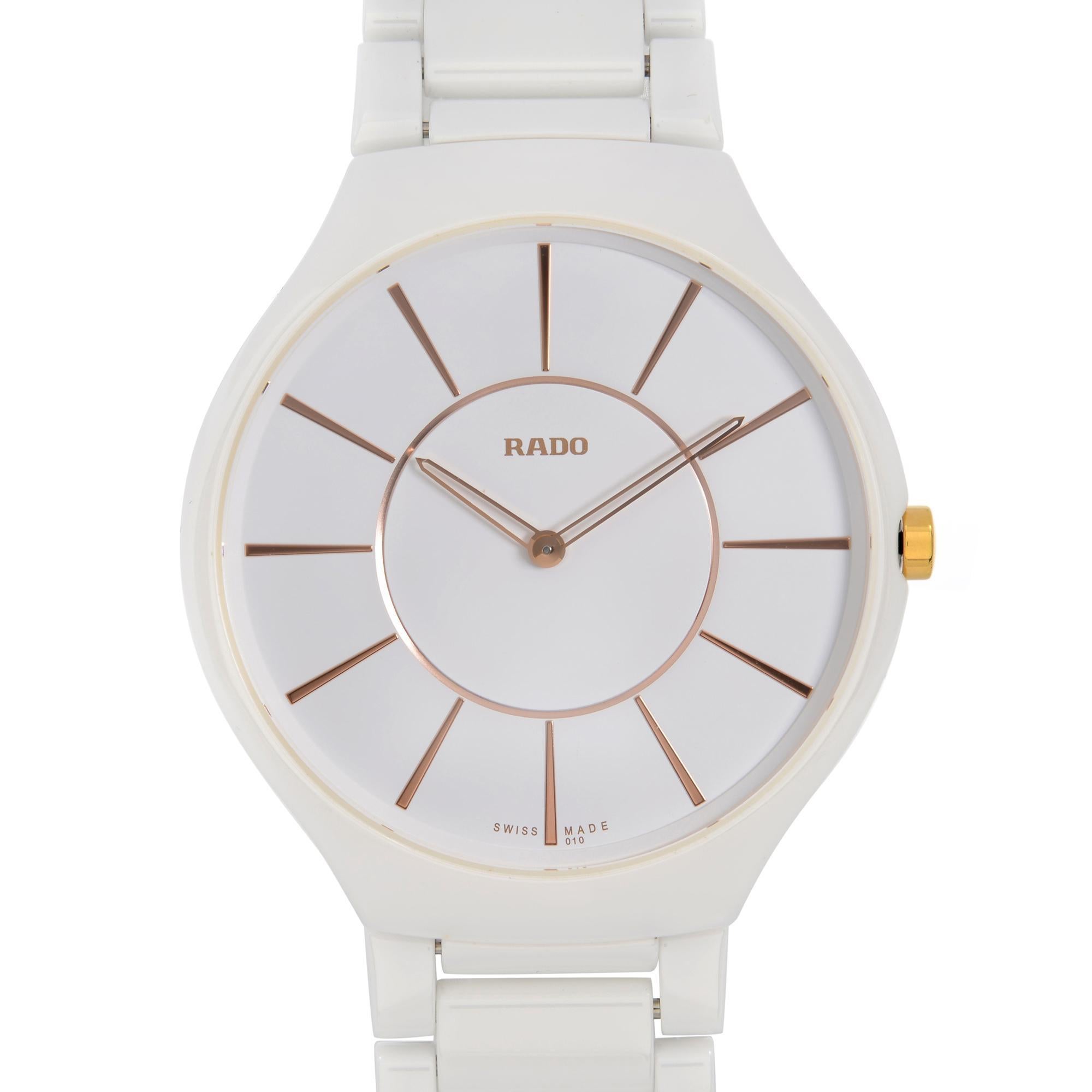 Display Model Rado True Thinline 39mm High-Tech Ceramic White Dial Ladies Watch R27957102. This Ladies Timepiece is Powered by a Quartz (Battery) Movement and Features: White Ceramic Case and Bracelet, Fixed White Ceramic Bezel, White Dial with Rose
