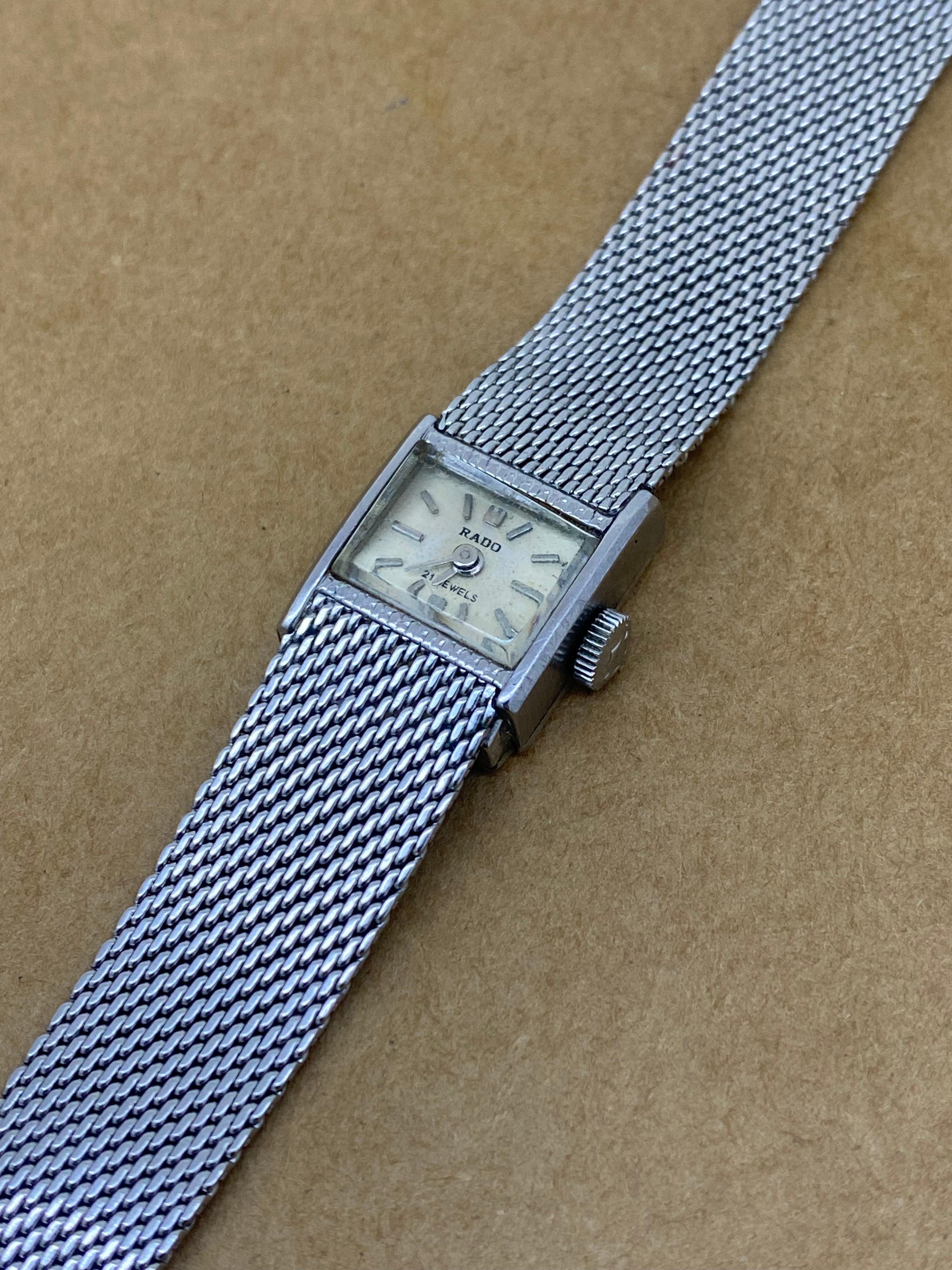 This rarely seen vintage c1960’s wristwatch by Rado 
features ALL original parts:

An elegant S/Steel Square Case, 
measuring 15mm (not including winder) x 
16mm (from lug to lug), 
completed by original Rado winder
Case back is numbered 

Swiss