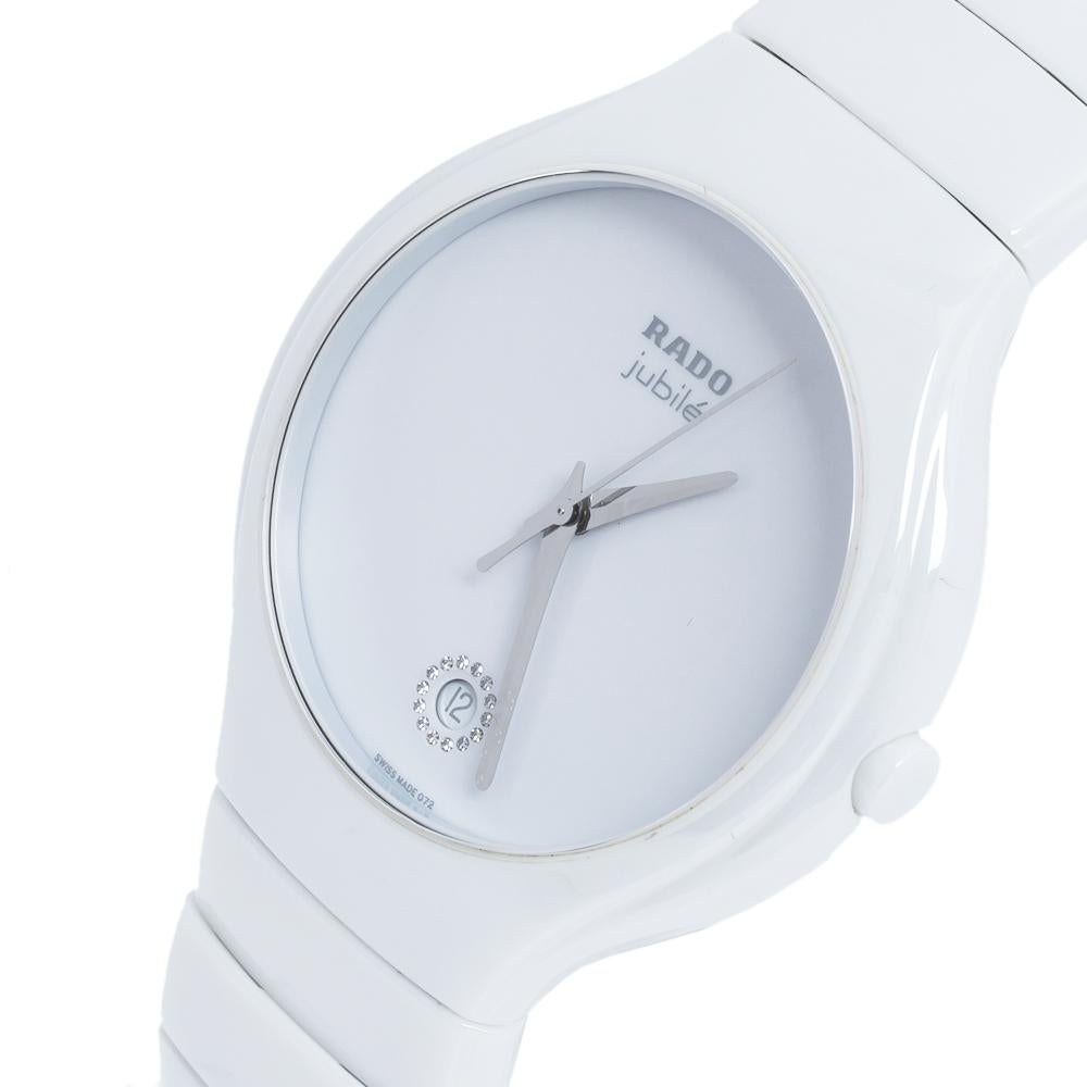 This watch from the house of Rado features a white dial with three hands and a date window. The 40 MM ceramic case features a fixed bezel and is held by a high tech ceramic and titanium bracelet. The quartz movement and water resistance up to 30