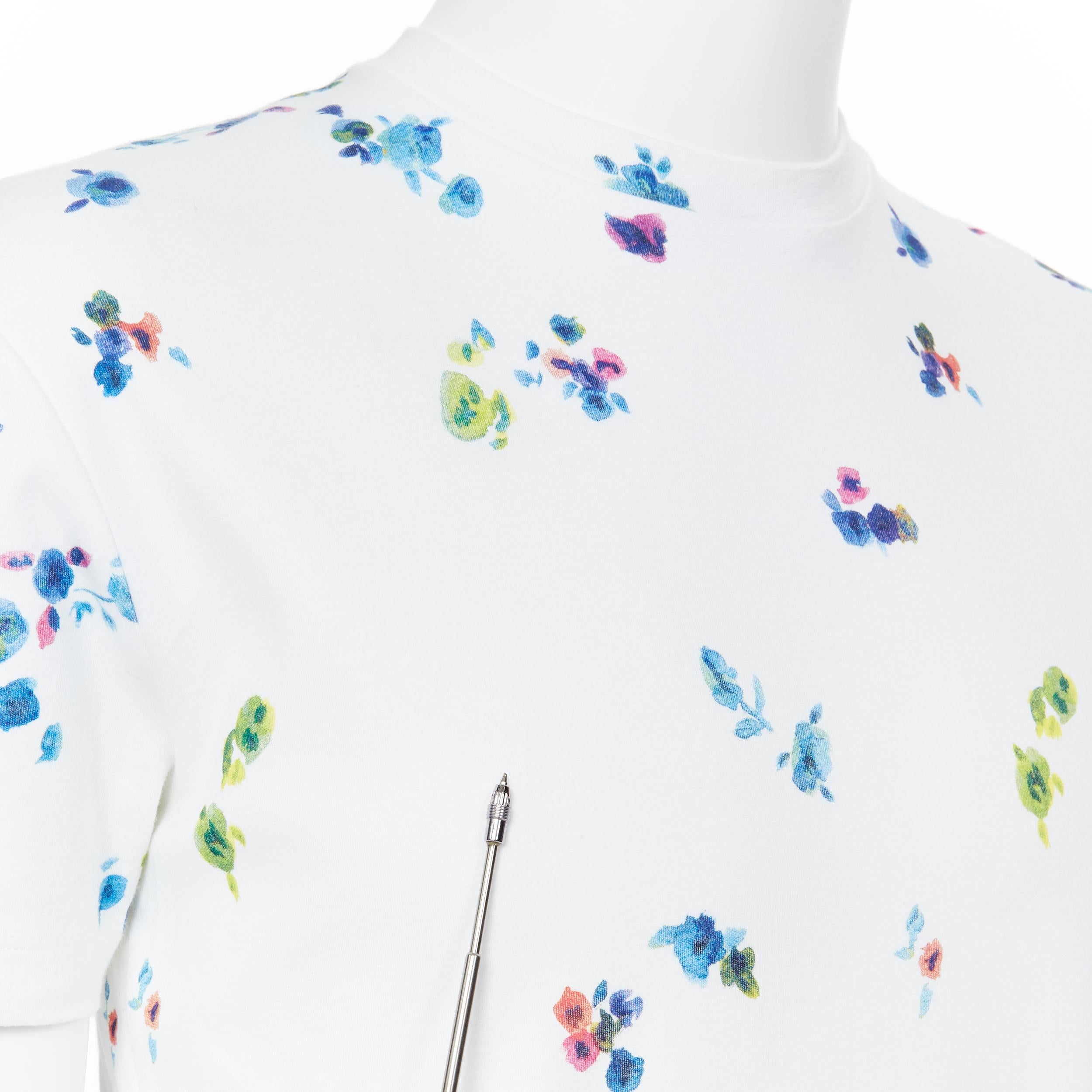 RAF SIMONS 100% white multicolor watercolor floral print short sleeve t-shirt XS
Brand: Raf Simons
Model Name / Style: T-shirt
Material: Cotton
Color: White
Pattern: Floral
Extra Detail: Short sleeve. Crew neck neckline.
Made in: