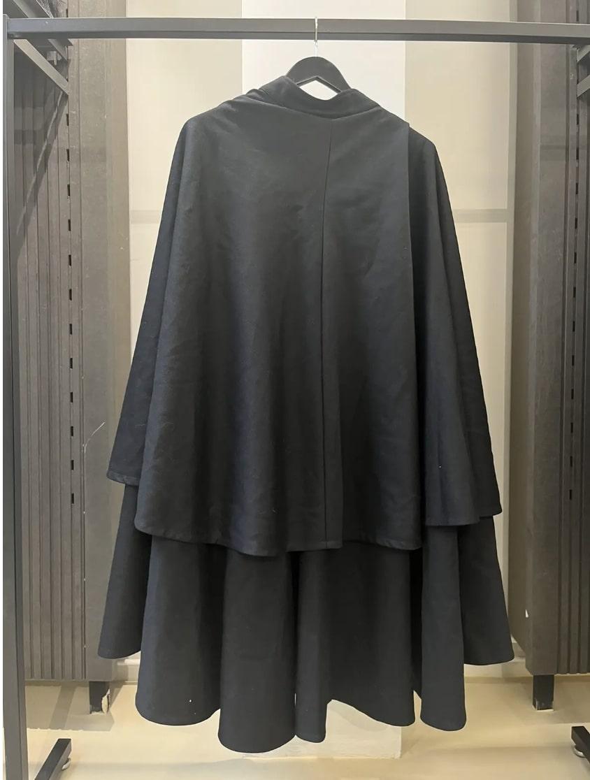 Raf Simons
AW 1998 Multi Layer Wool Cloak Cape
One Size

Beautiful Raf Simons wool cloak cape from the autumn winter 1998 collection. Absolute Raf grail, super heavy piece. Only flaw is the loose chain. Made in Belgium. One size.