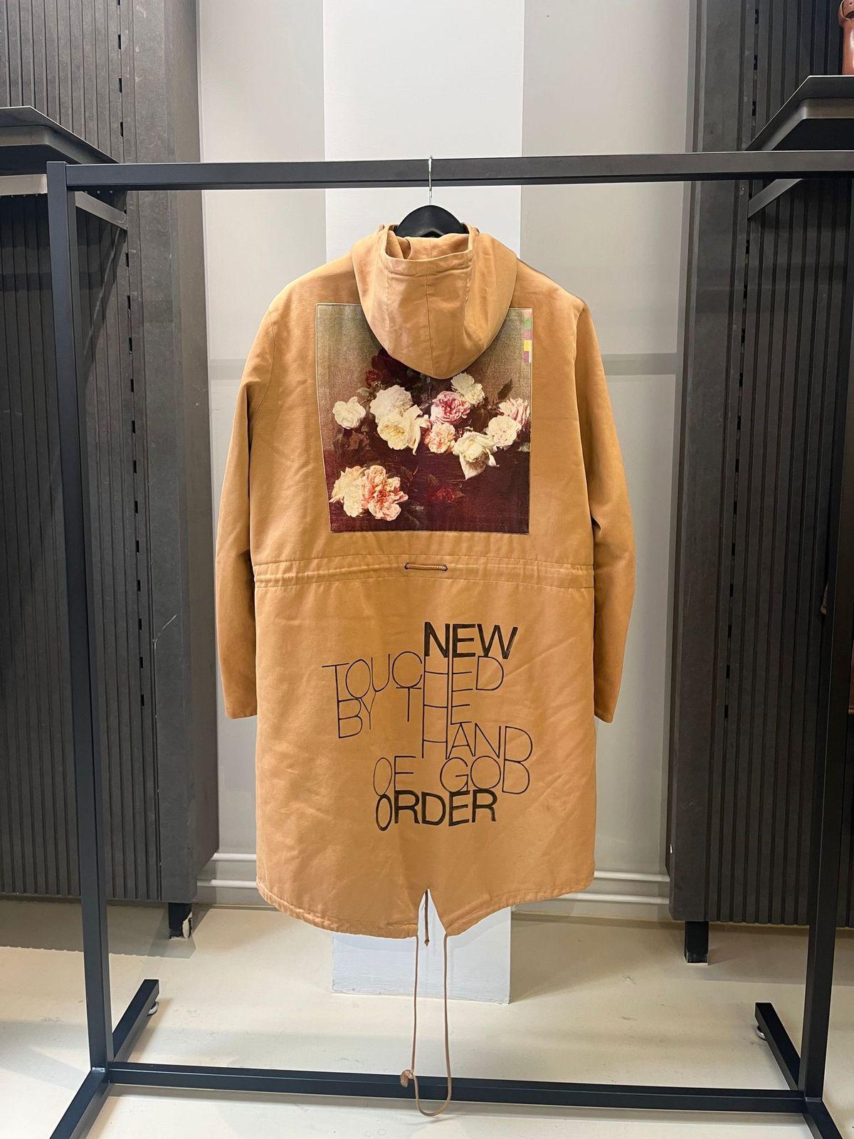 Raf Simons
AW03 Closer New Order Parka
Size 48

One of the most iconic pieces of Raf Simons. The AW03 Closer parka which has been hand-painted. In great condition, please refer to the pictures. Size 48, fits true to size.
