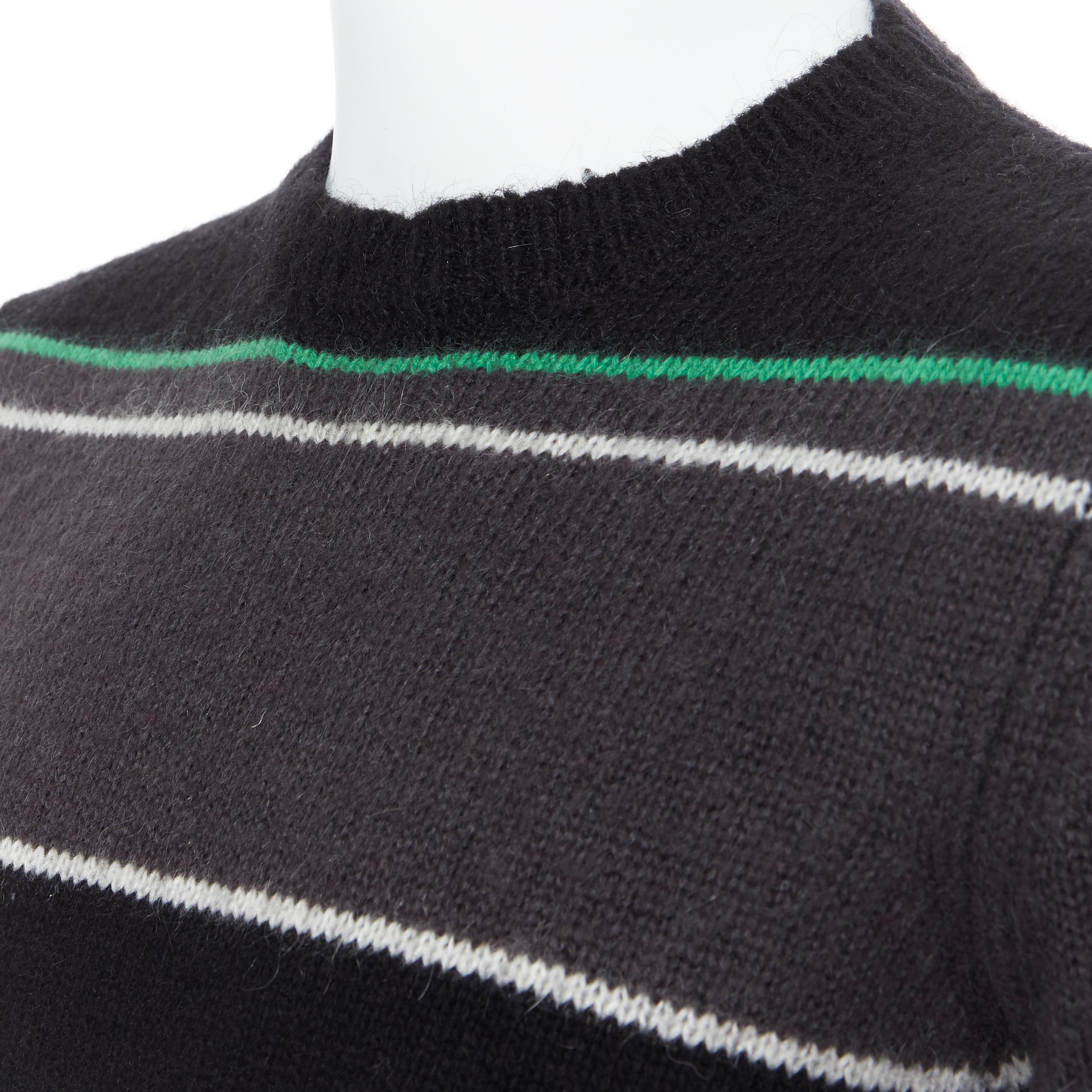 RAF SIMONS black grey merino wool blend striped long sleeve sweater S
Brand: Raf Simons
Designer: Raf Simons
Model Name / Style: Wool sweater
Material: Wool blend
Color: Black
Pattern: Striped
Extra Detail: Long sleeve. Round neck neckline.
Made in: