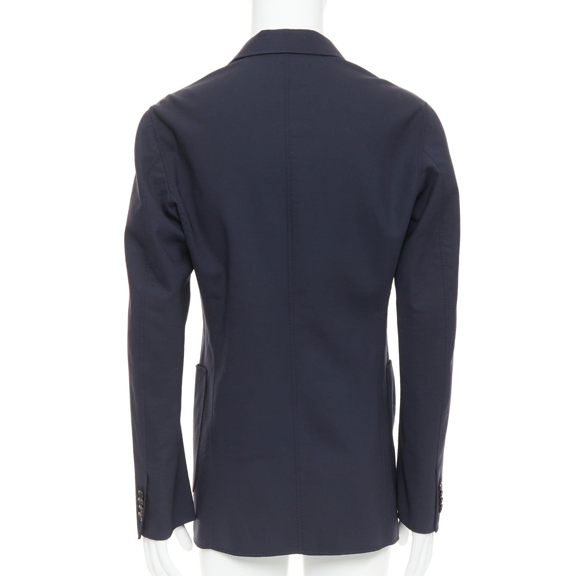 De los hombres RAF SIMONS blazer largo de lana virgen negra con botones descentrados y bolsillo de parche IT48 M en venta