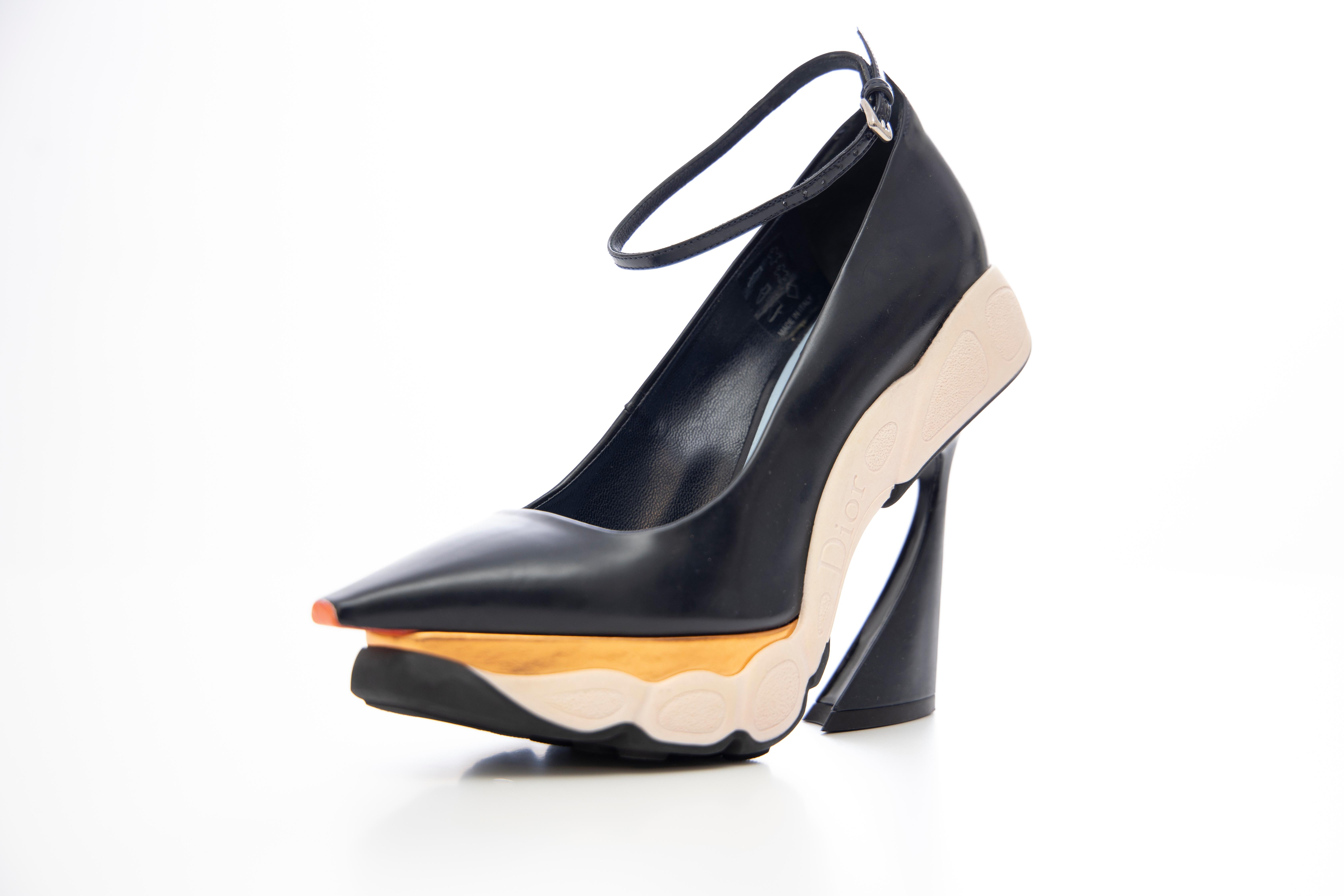 Raf Simons for Christian Dior, Fall 2014, patent leather, pointed-toe runway sneaker pumps with copper-tone metallic leather accents, rubber soles, covered heels with ankle straps. Includes shoe box.

IT. 36, US. 6
Heels: 5.5