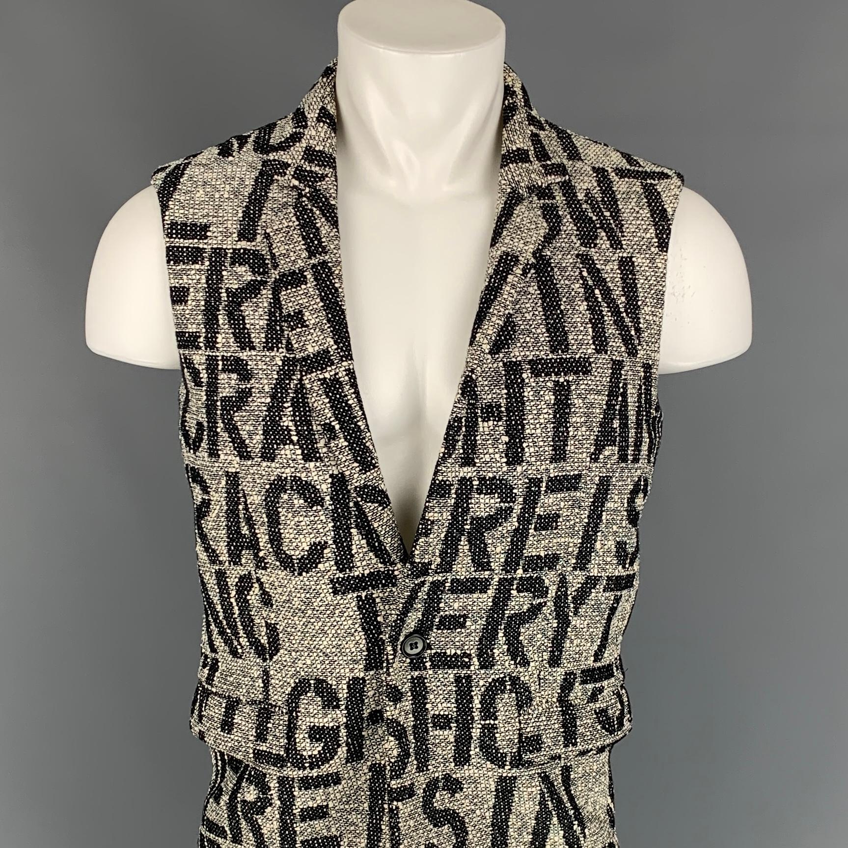 RAF SIMONS Spring-Summer 2009 vest comes in a white & black woven with a Christopher Wool inspired print the reads 