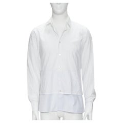 RAF SIMONS camicia bianca con orlo a strati esteso e decostruito EU44 S