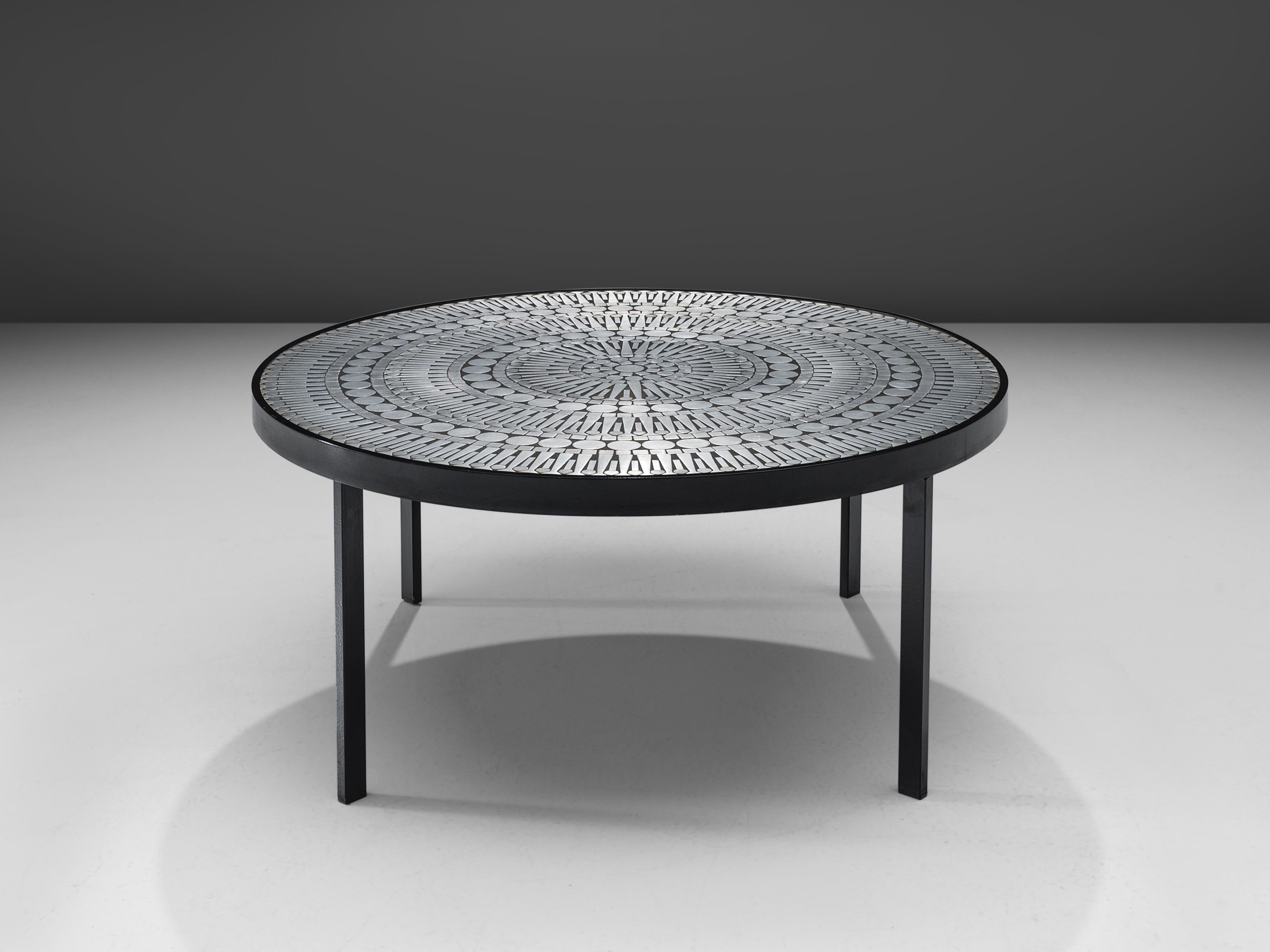 Raf Verjans, table, aluminum, resin, enameled steel, Belgium, 1970s

This cocktail table is designed by the Belgian designer Raf Verjans. The table has a perfectly executed aluminum mosaic that is inlayed in resin and framed with enameled steel. The