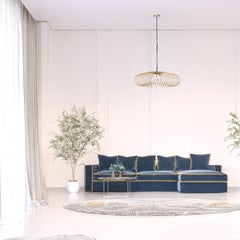 Sofá angular de terciopelo azul oscuro y amarillo Rafaella Bio by Biosofa