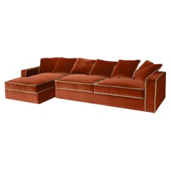 Divano angolare Rafaella Bio in velluto arancione e beige