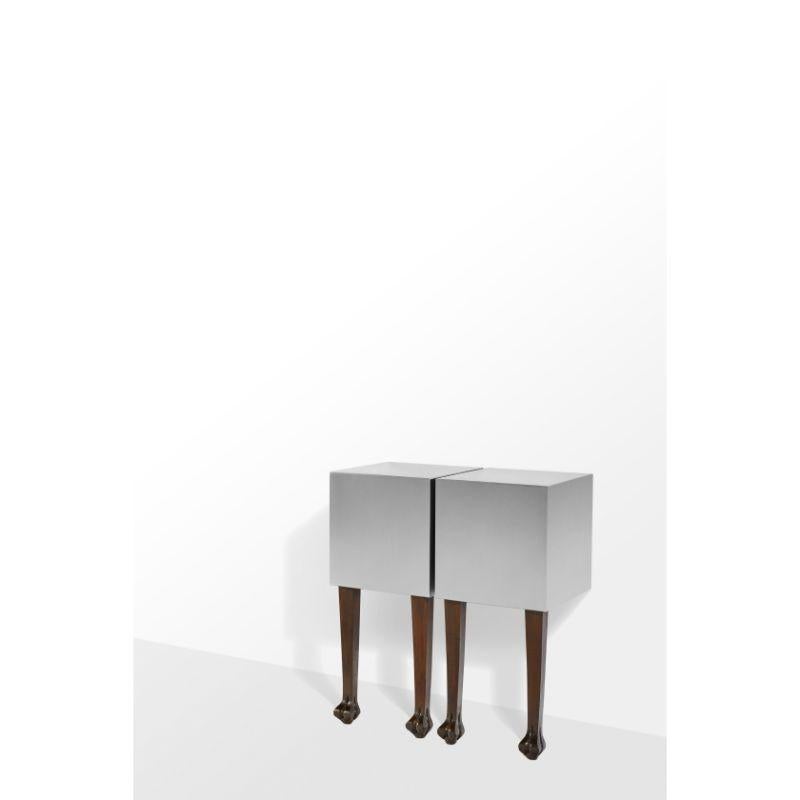 Raffaello console by Daniele Daminelli (Italy, 2021)
Capsule Collection REINASSANCE 
Dimensions: 40 x 40 x 90 cm
Materials: carved wood and satin steel structure

Blades and monoliths of pure abstraction are embedded onto the monumental legs of