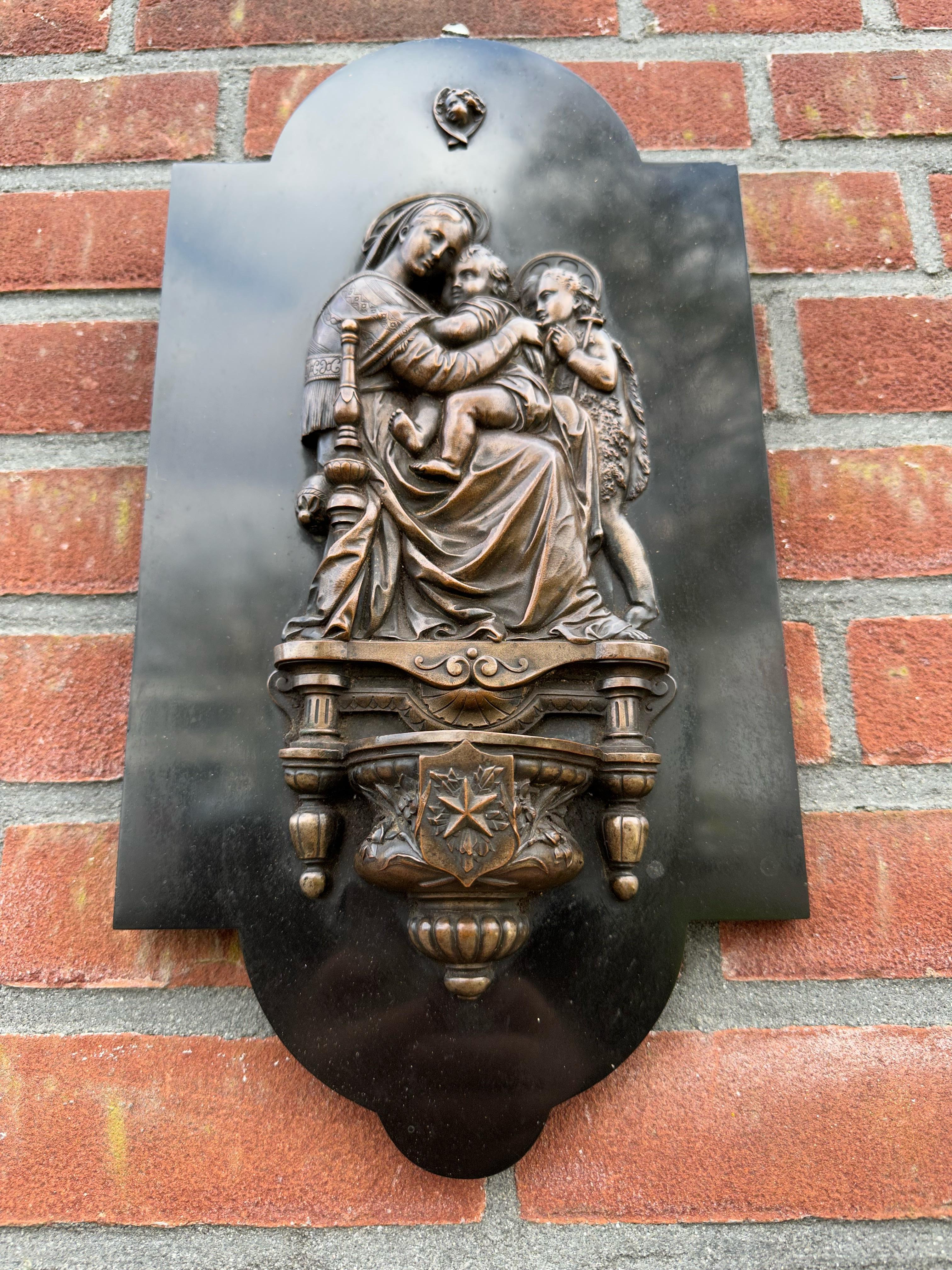 Meaningful and great quality antique, relic bronze and marble wall plaque with holy water font, after the famous painting of Raffaello.

This antique work of religious art from the late 1800s comes with an incredibly detailed, bronze Mary and