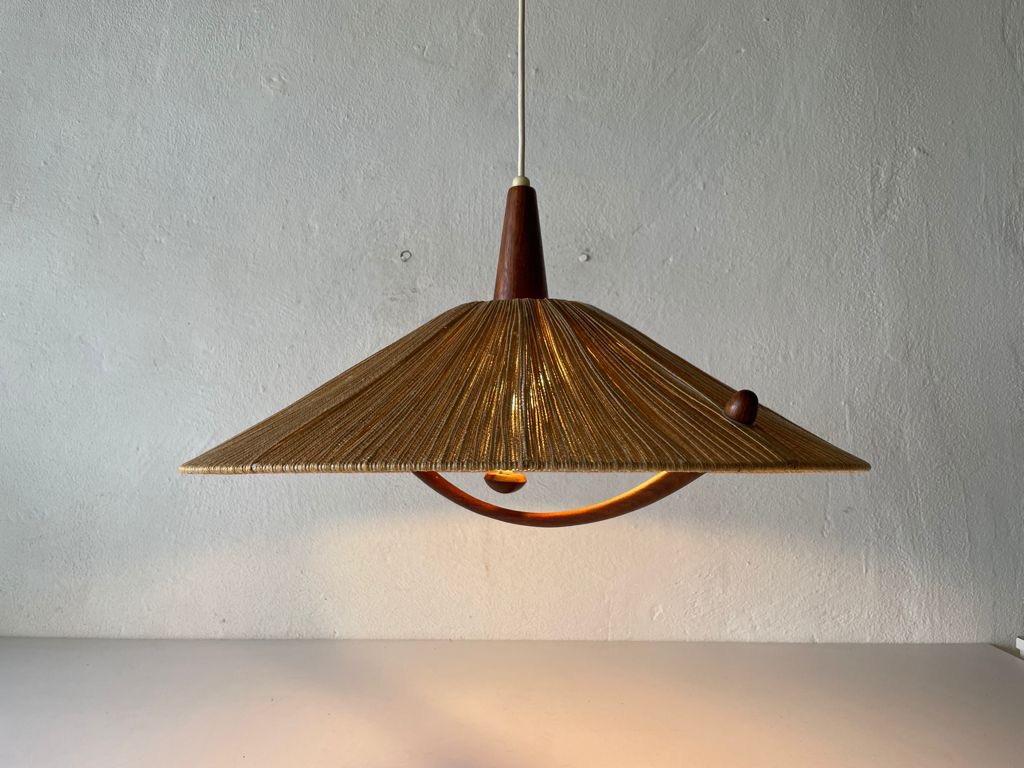 Raffia bast and teak pendant lamp by Temde, 1960s, Germany

Lampshade is in very good vintage condition.


This lamp works with E27 light bulb. Max 100W
Wired and suitable to use with 220V and 110V for all