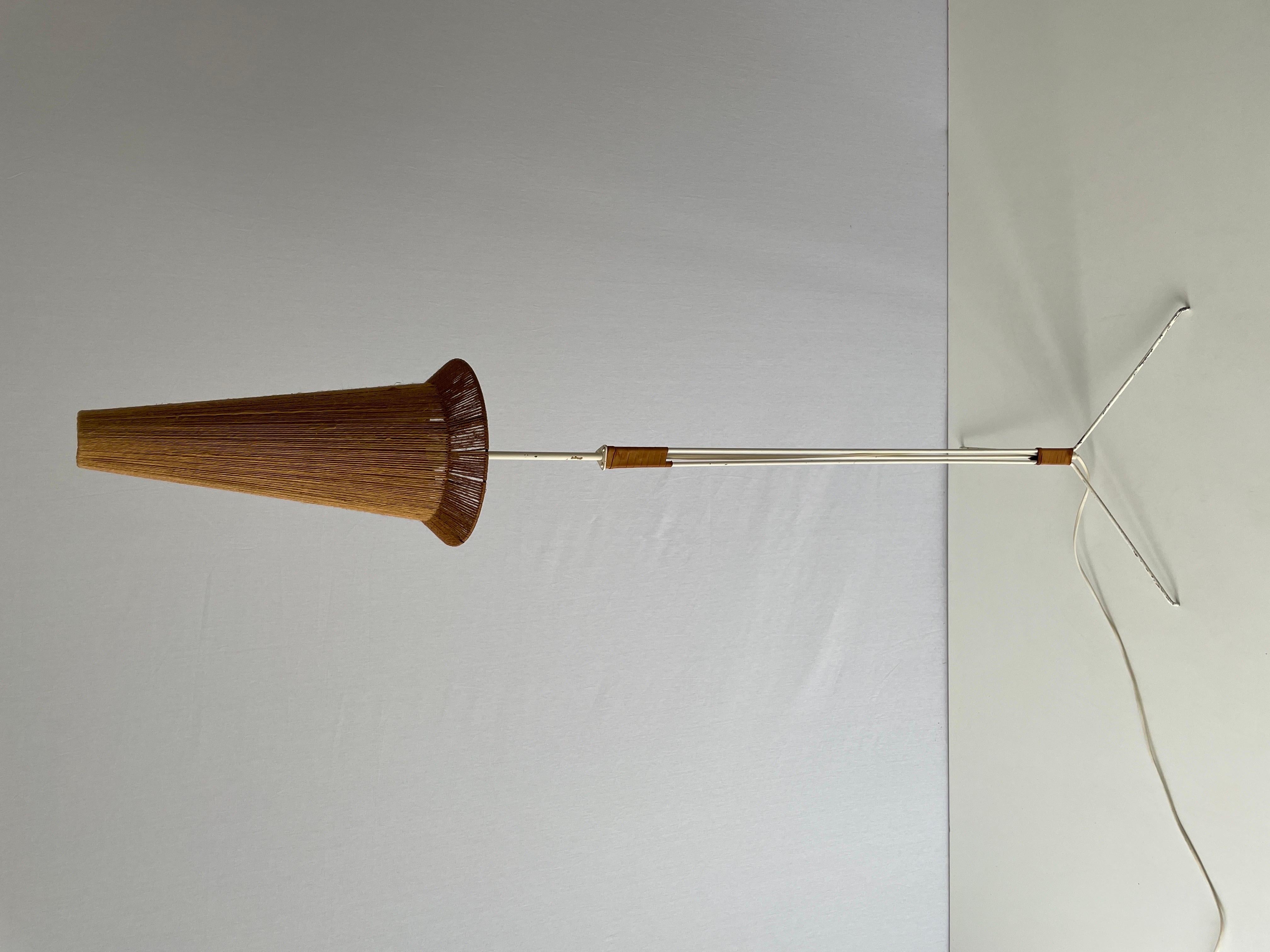 Raffia Bast Floor Lamp by Hans-Agne Jakobsson for Markaryd, 1960s, Sweden
Lamp is in very good vintage condition with leather details

This lamp works with E27 light bulb. Max 100W
Wired and suitable to use with 220V and 110V for all