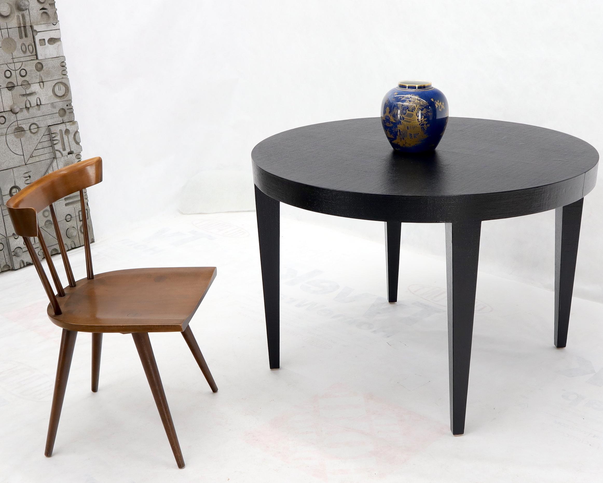 Mid-Century Modern cloth or raffia wrapped black lacquer round dining table with two 20