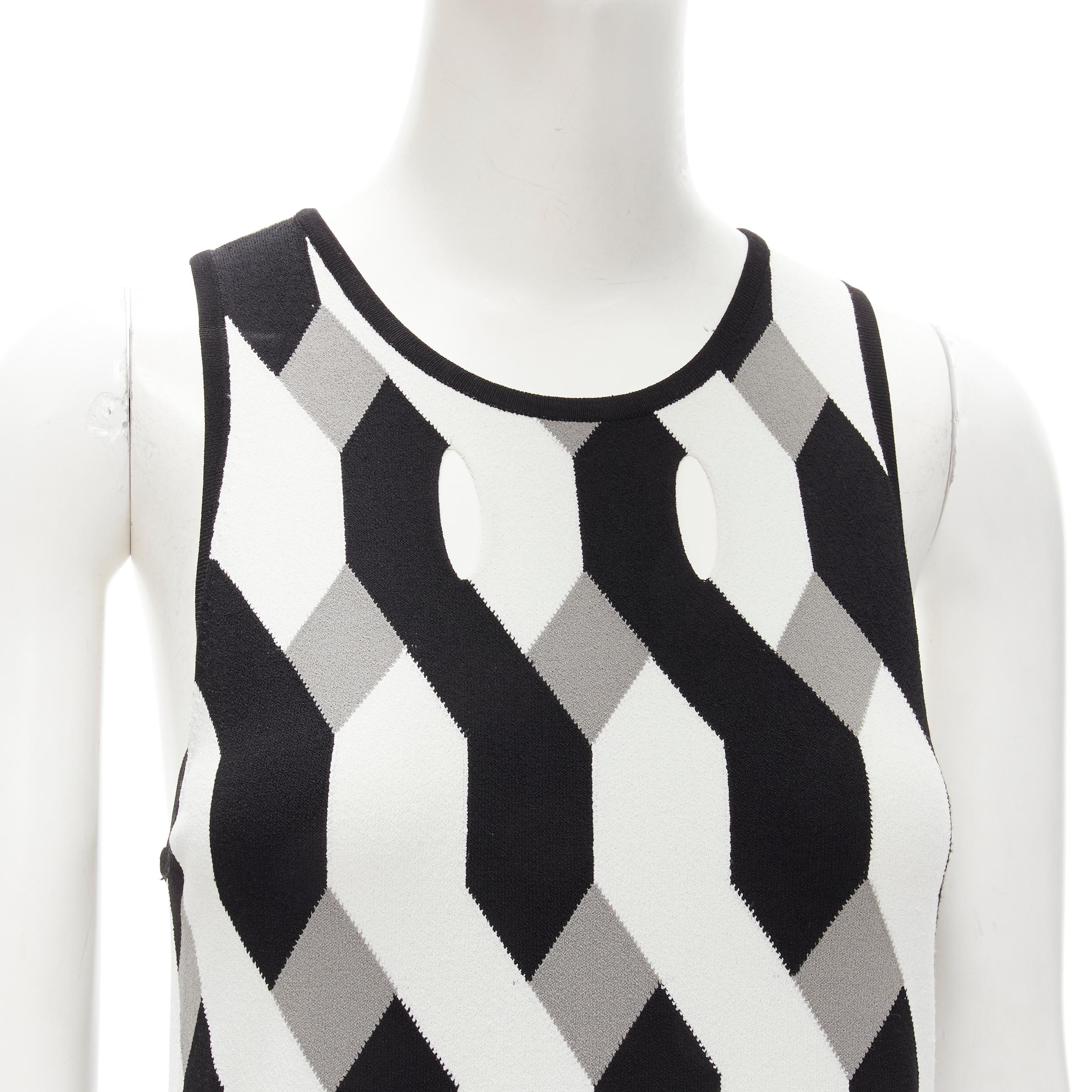 RAG & BONE black grey geometric woven cut out knitted dress S
Brand: rag & bone
Color: Grey
Pattern: Geometric
Extra Detail: Cut out throughout. Side slit at hem.
Made in: China

CONDITION:
Condition: Excellent, this item was pre-owned and is in