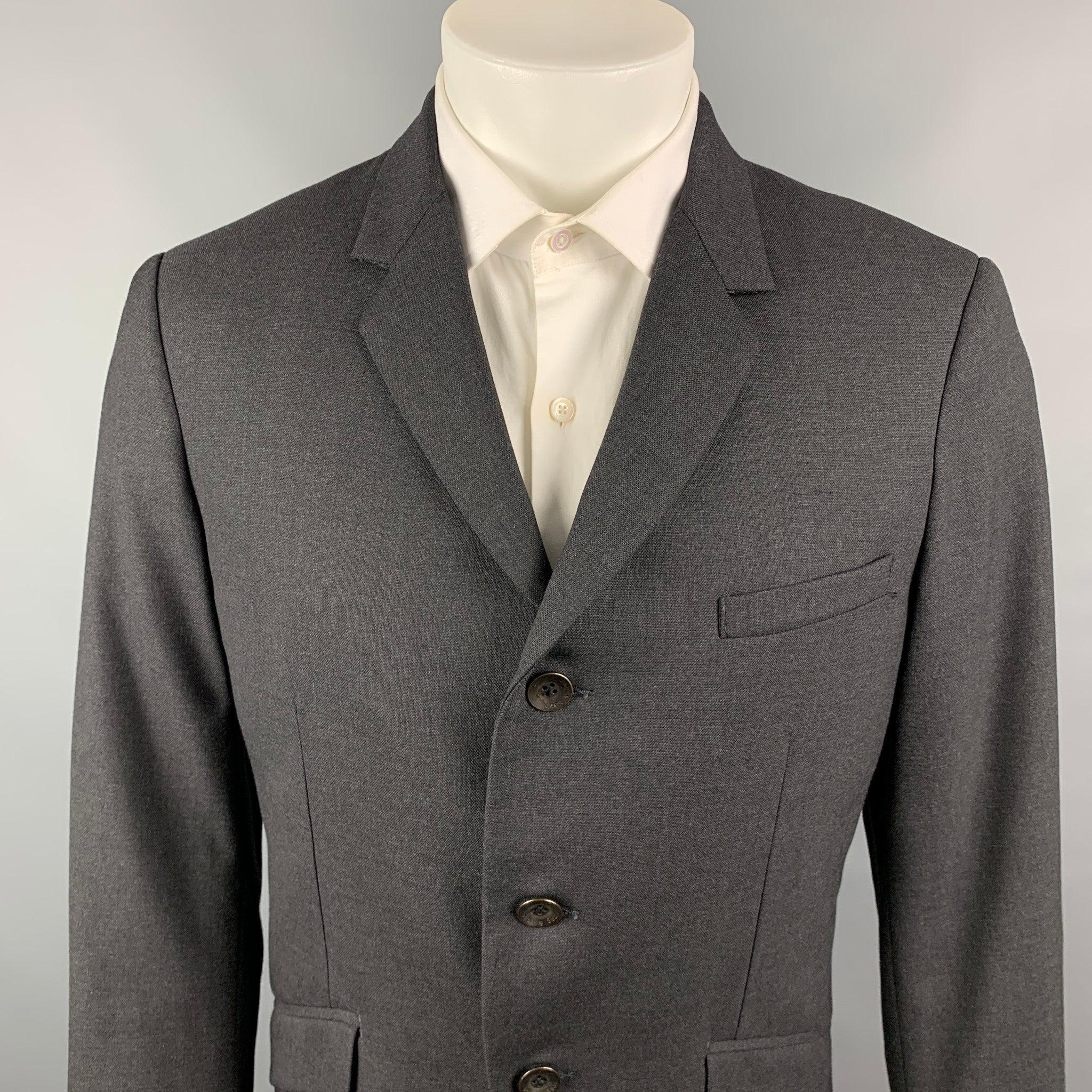 RAG & BONE sport coat comes in a charcoal wool with a full liner featuring a notch lapel, flap pockets, and a three button closure. Made in USA.Very Good Pre-Owned Condition. 

Marked:   40 

Measurements: 
 
Shoulder: 18 inches  Chest: 40 inches 