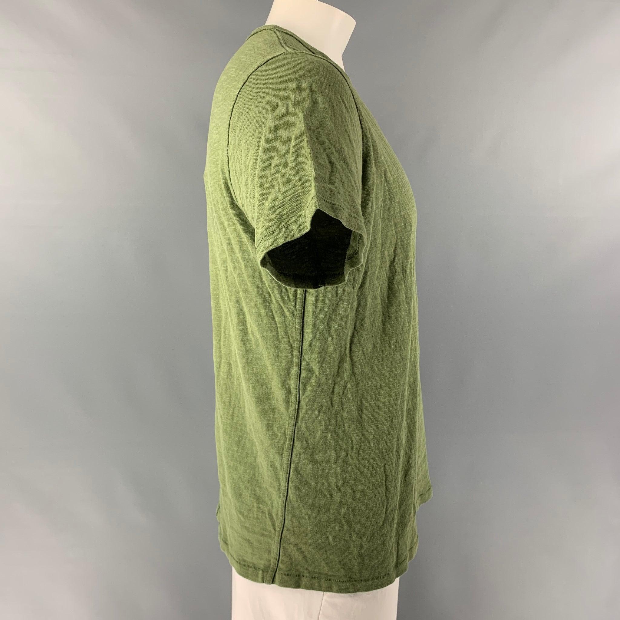 RAG & BONE
 t-shirt comes in an olive textured heather knit cotton jersey featuring a crew-neck and center back seam. Excellent Pre- Owned Conditions. 

Marked:   L 

Measurements: 
 
Shoulder: 16.5 inches Chest: 49 inches Sleeve: 8 inches Length: