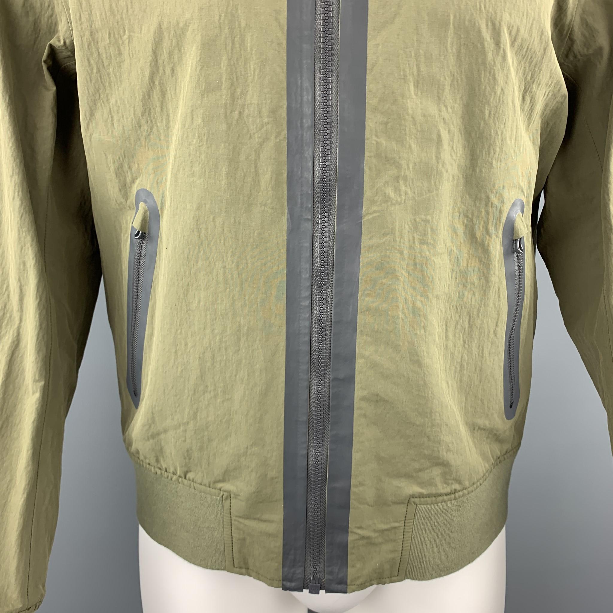 RAG & BONE bomber jacket comes in mate windbreaker material with a cotton knit baseball collar and grey trimmed zippers. 

Excellent Pre-Owned Condition.
Marked: M

Measurements:

Shoulder: 17 in.
Chest: 47 in.
Sleeve: 26 in.
Length: 26 in.