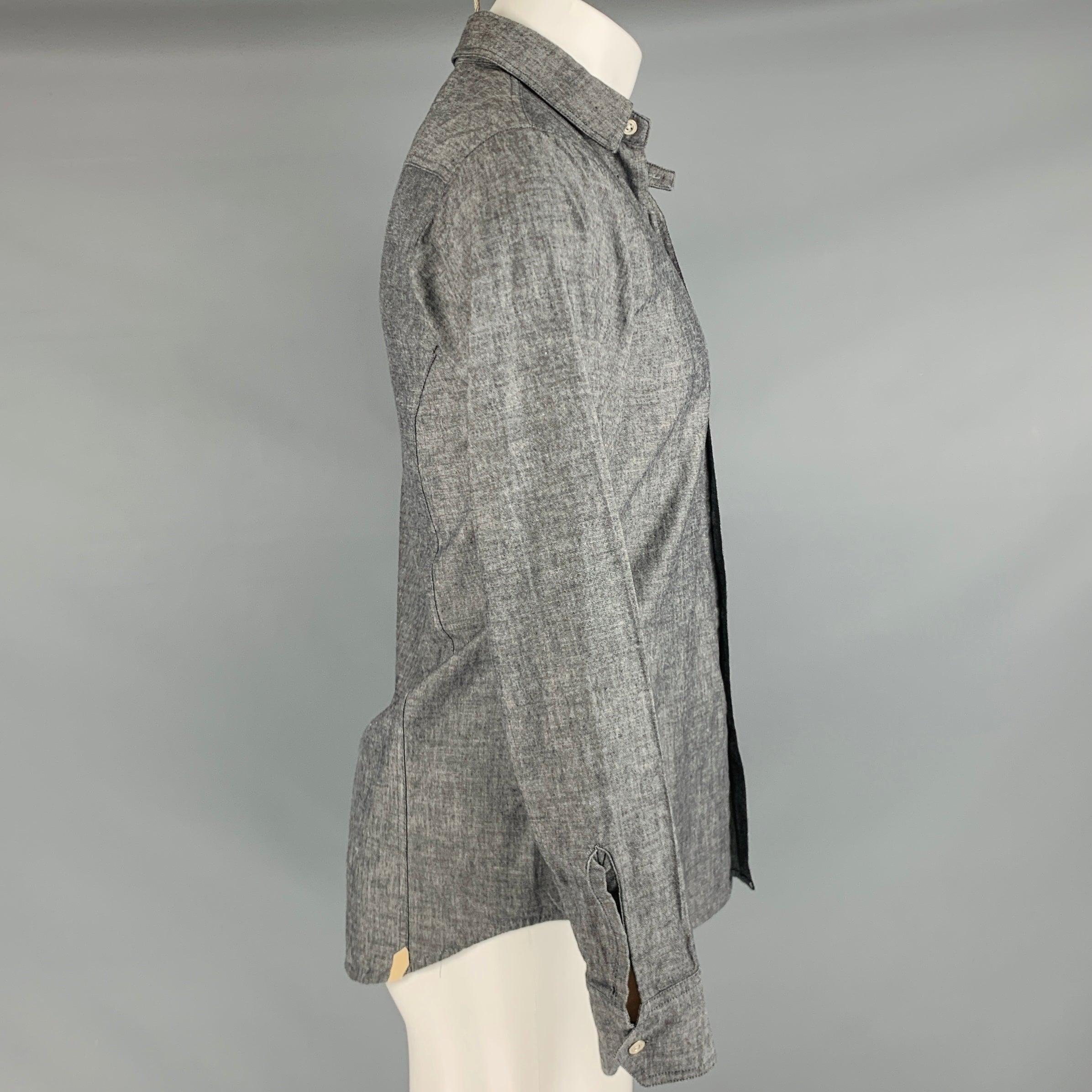 RAG & BONE long sleeve shirt
in a
grey cotton fabric featuring one pocket, spread collar, and button closure. Made in USA.Excellent Pre-Owned Condition. 

Marked:   S 

Measurements: 
 
Shoulder: 16 inches Chest: 38 inches Sleeve: 25 inches Length:
