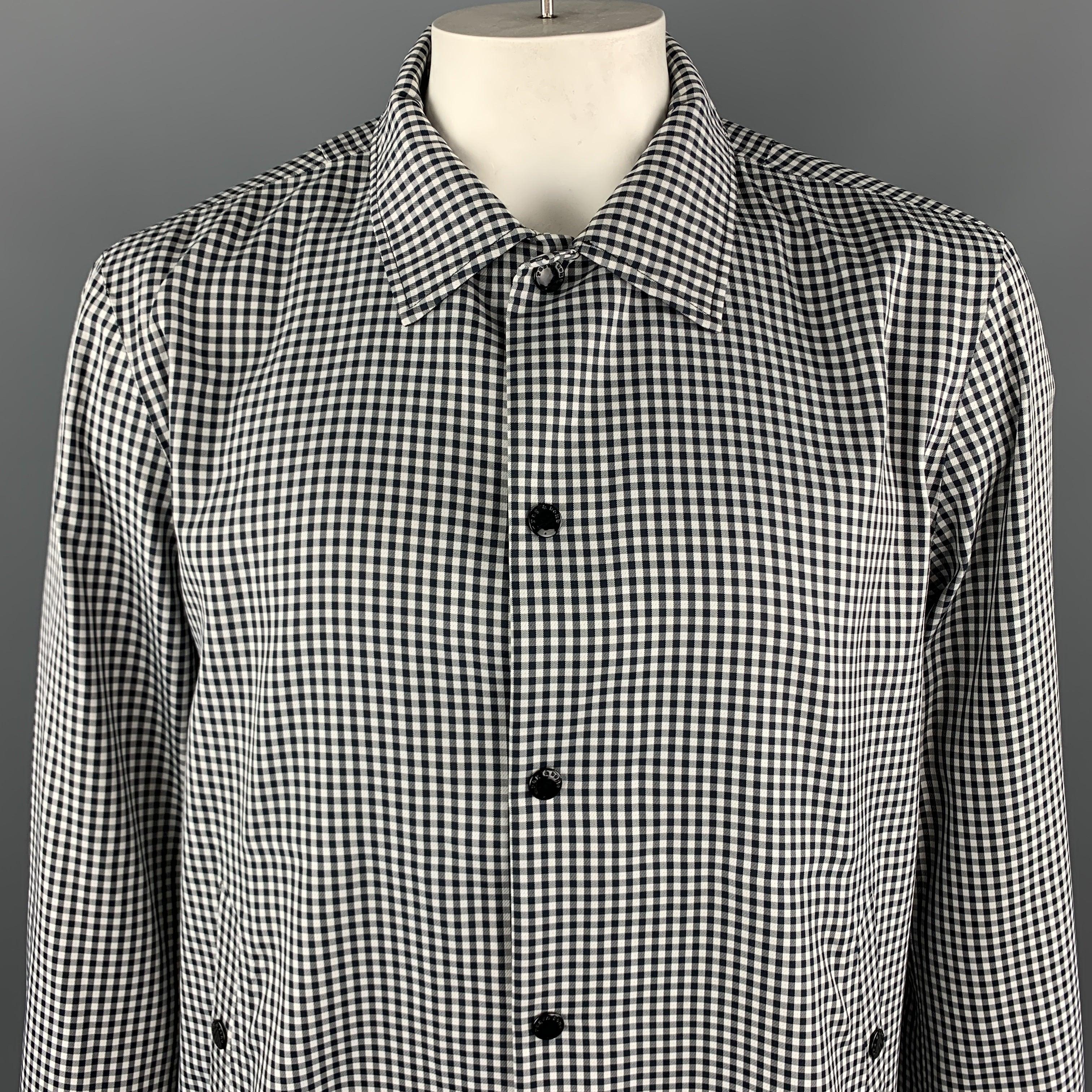 RAG & BONE
Jacket comes in a black and white checkered polyester material, with snaps at closure and pockets, a drawstring at hem, unlined.
Excellent Pre-Owned Condition. 

Marked:   XL 

Measurements: 
 
Shoulder: 18.5 inches 
Chest: 52 inches