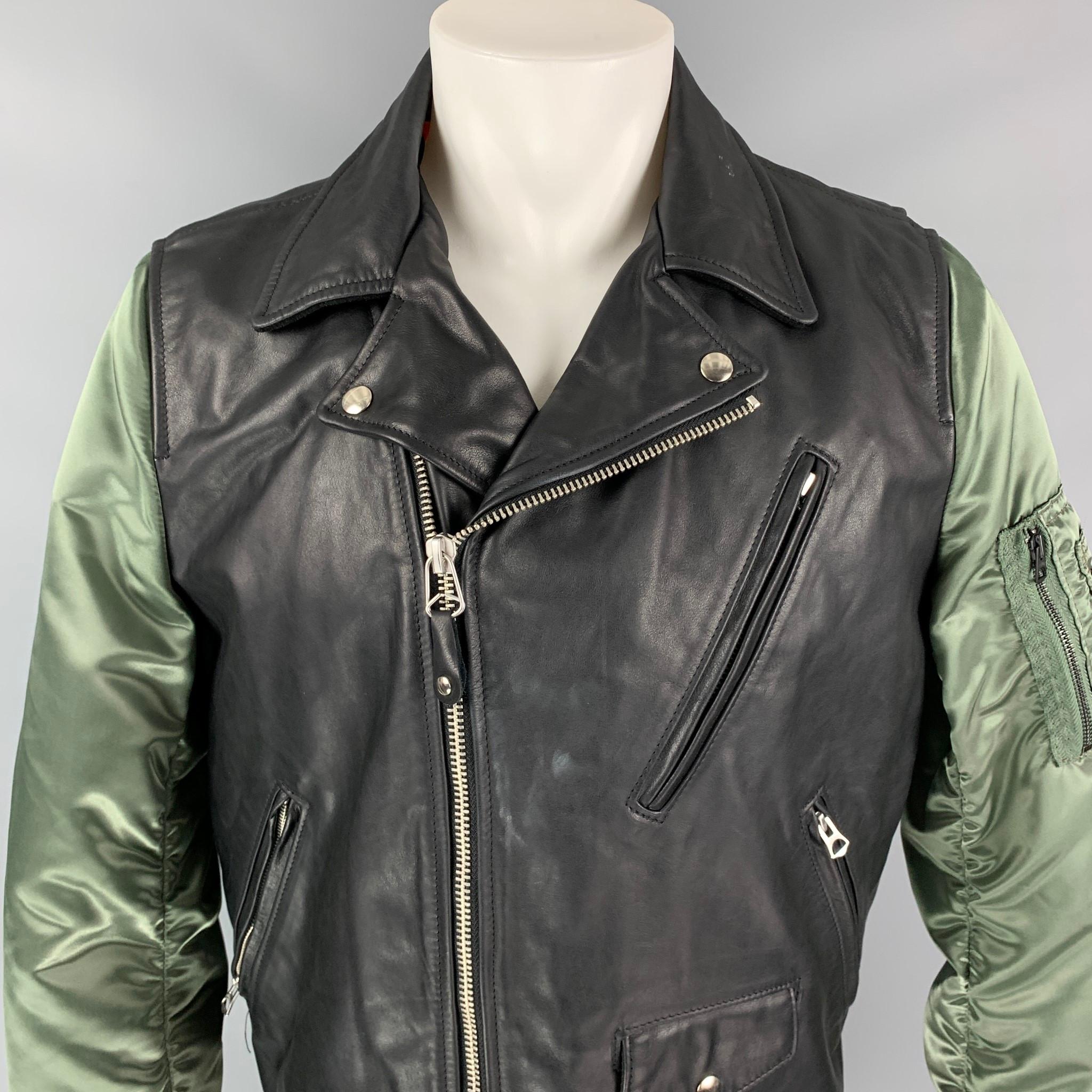 RAG & BONE x SCHOTT PERFECTO jacket comes in a back leather with a full orange liner featuring olive green nylon sleeves, biker style, front pockets, and a zip up closure. Made in USA.

Excellent Pre-Owned Condition. Fabric tag removed.
Marked: