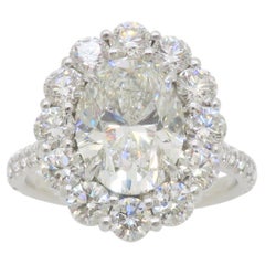 Anello Rahaminov con diamante aureolato in oro bianco 18 carati certificato GIA