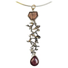 Raíces de Rubí Pendant Necklace in 950 Silver and Rubies by Macarena Ravioly