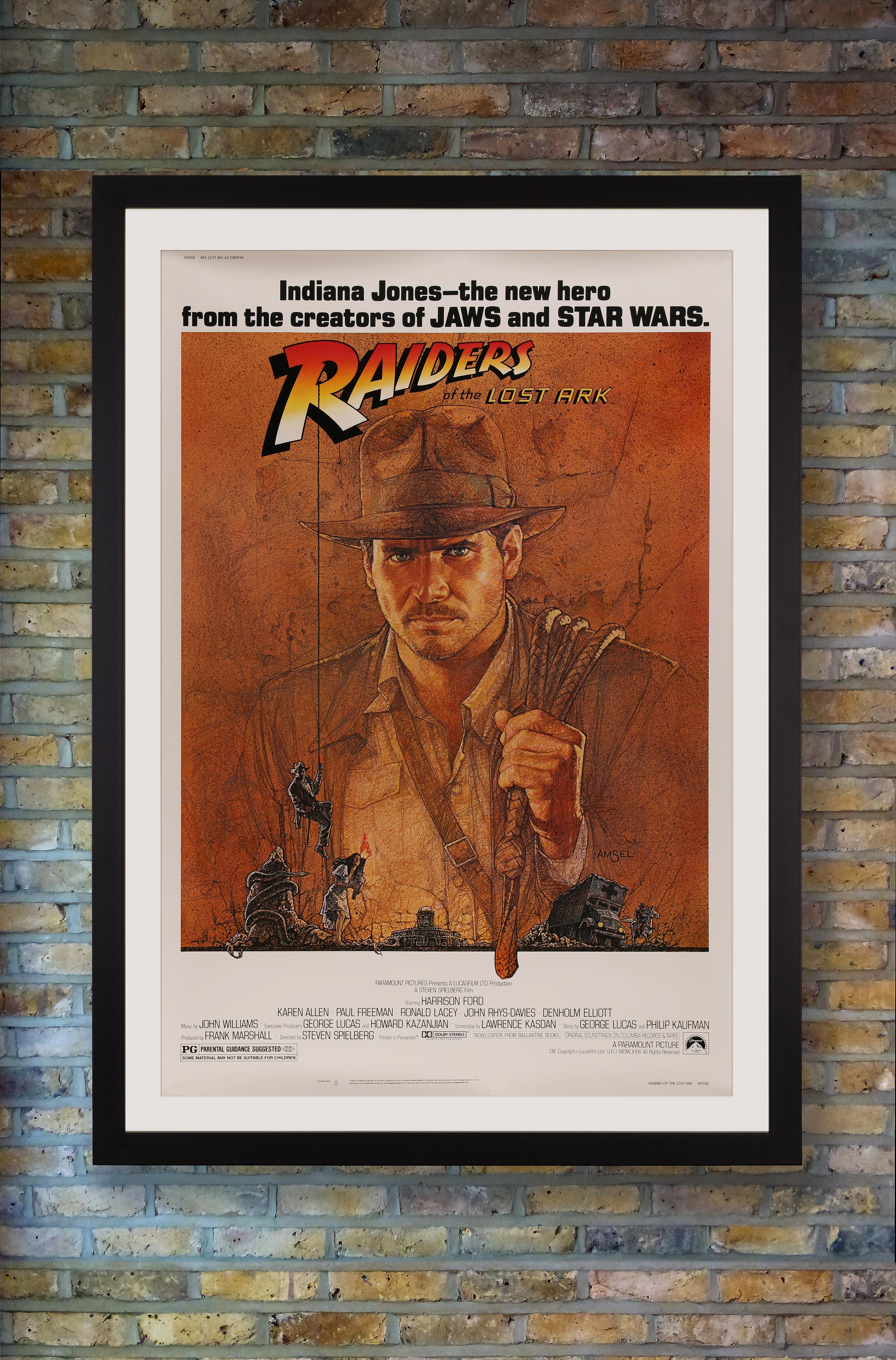 A rare US 40 x 60 poster for the original release of 'Raiders of the Lost Ark' featuring Richard Amsel's iconic illustration of Indiana Jones with his whip slung over his shoulder. Conceived by producer George Lucas and directed by Steven Spielberg