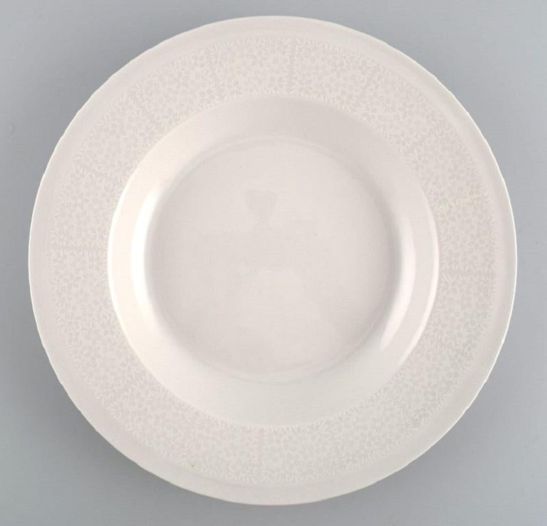 Raija Uosikkinen for Arabia. 10 Rare Pitsi deep plates with floral decoration. 
Dated 1967-1974.
Measures: 24.5 x 3.5 cm.
In excellent condition.
Stamped.