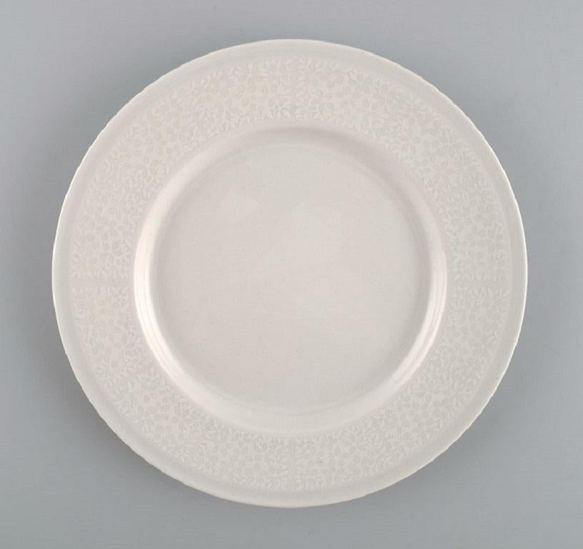 Raija Uosikkinen for Arabia. 
11 rare Pitsi side plates with floral decoration. Dated 1967-1974.
Diameter: 17 cm.
In excellent condition.
Stamped.
