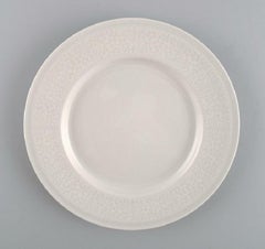 Raija Uosikkinen for Arabia. 11 rare Pitsi side plates with floral decoration.