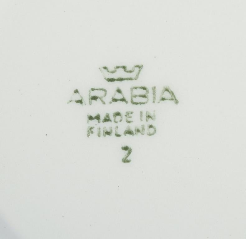Mid-20th Century Raija Uosikkinen for Arabia, Finland. Set of four ‘Ali’ coffee cups and saucers For Sale