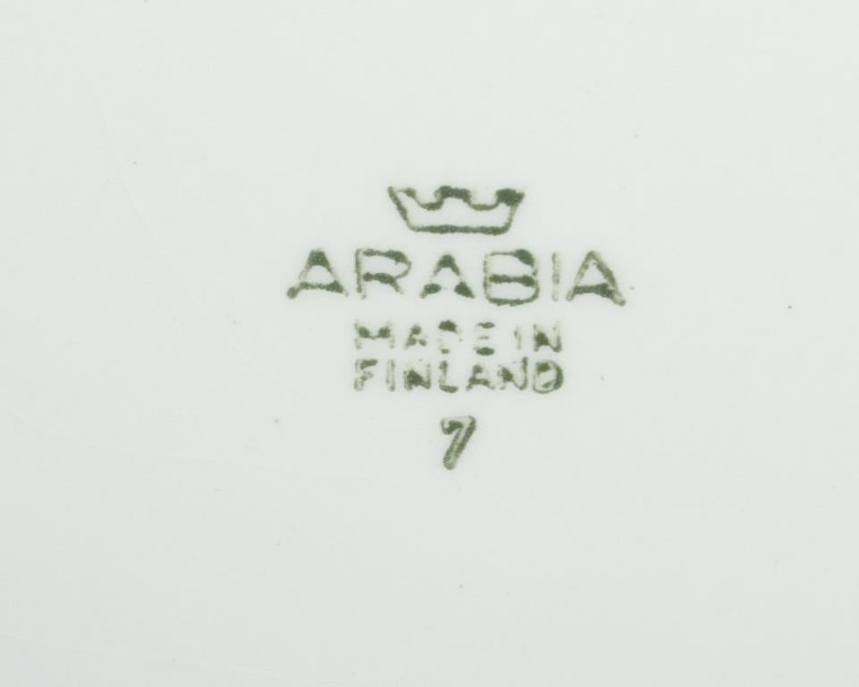 Raija Uosikkinen für Arabia, Finnland. Satz von zwölf Fayence-Tellern 