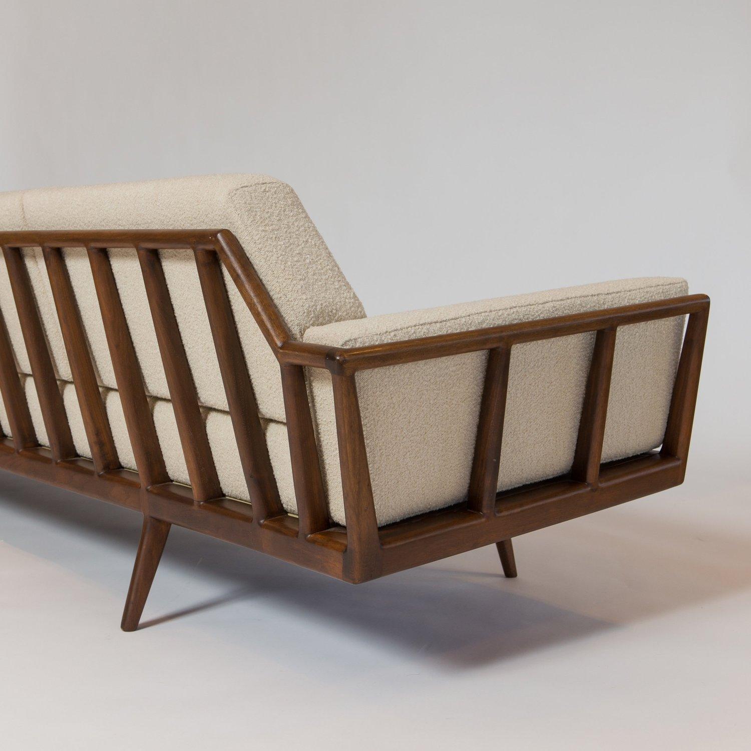 Originally designed by Mel Smilow in 1956 and officially reintroduced by his daughter Judy Smilow in 2013, the Rail Back Sofa is classically midcentury. This collection’s sculpted wooden frames gracefully envelop you, providing for a comfortable and