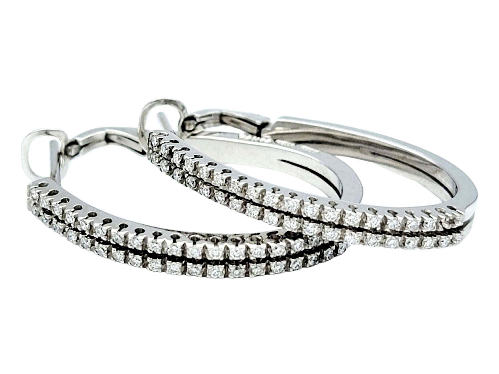 Contemporary Raima Round Diamond Double Column Oval Hoop Earrings Set in 18 Karat White Gold For Sale