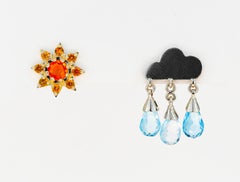 Rain and sun 14k gold earring studs.