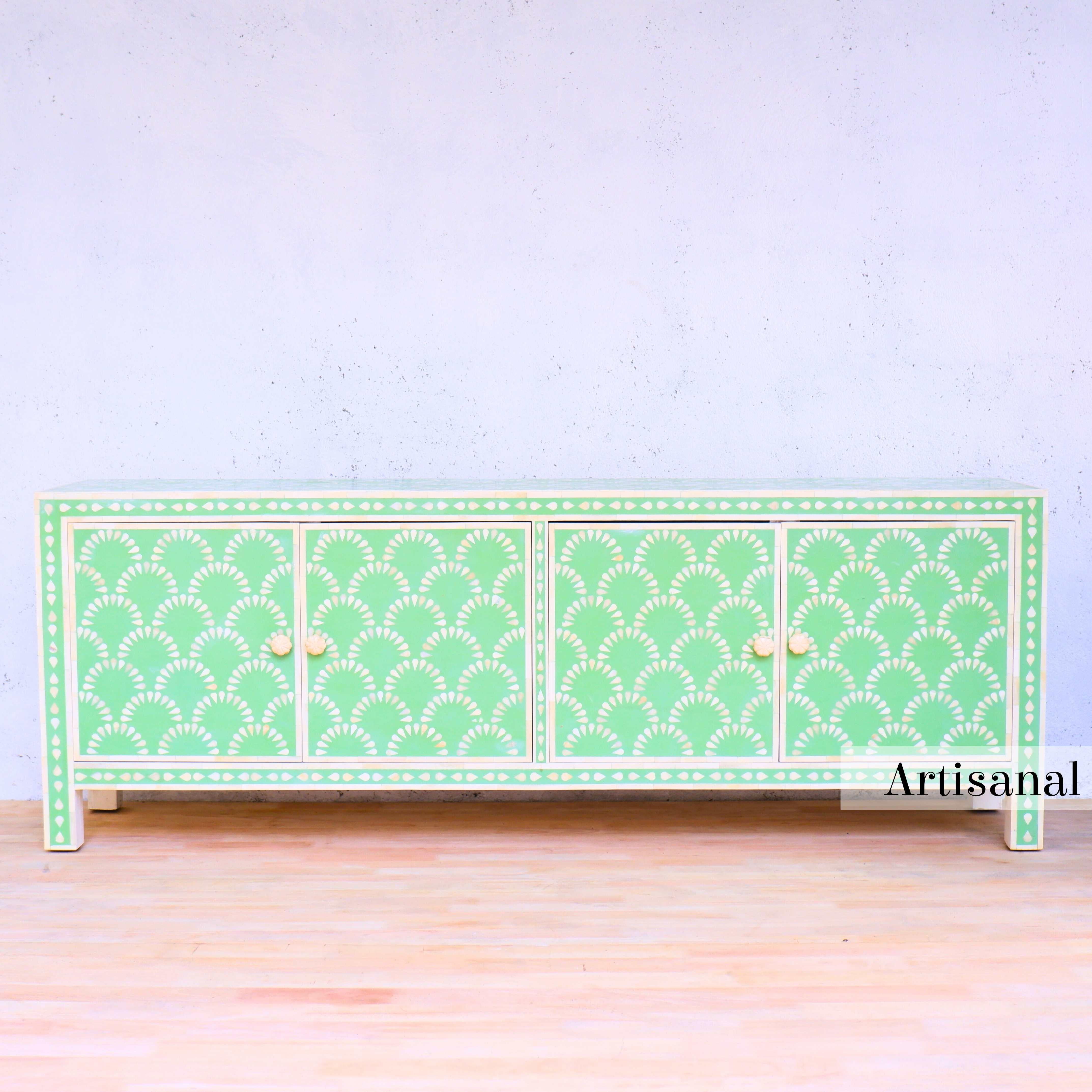Elevate your home with Artisanal's exquisite light green inlay media 
console —a stunning addition that seamlessly combines timeless craftsmanship with modern sophistication.

Adorned with intricate geometric pattern, this media console showcases