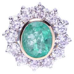 RAINA Ring with Diamonds and Emerald