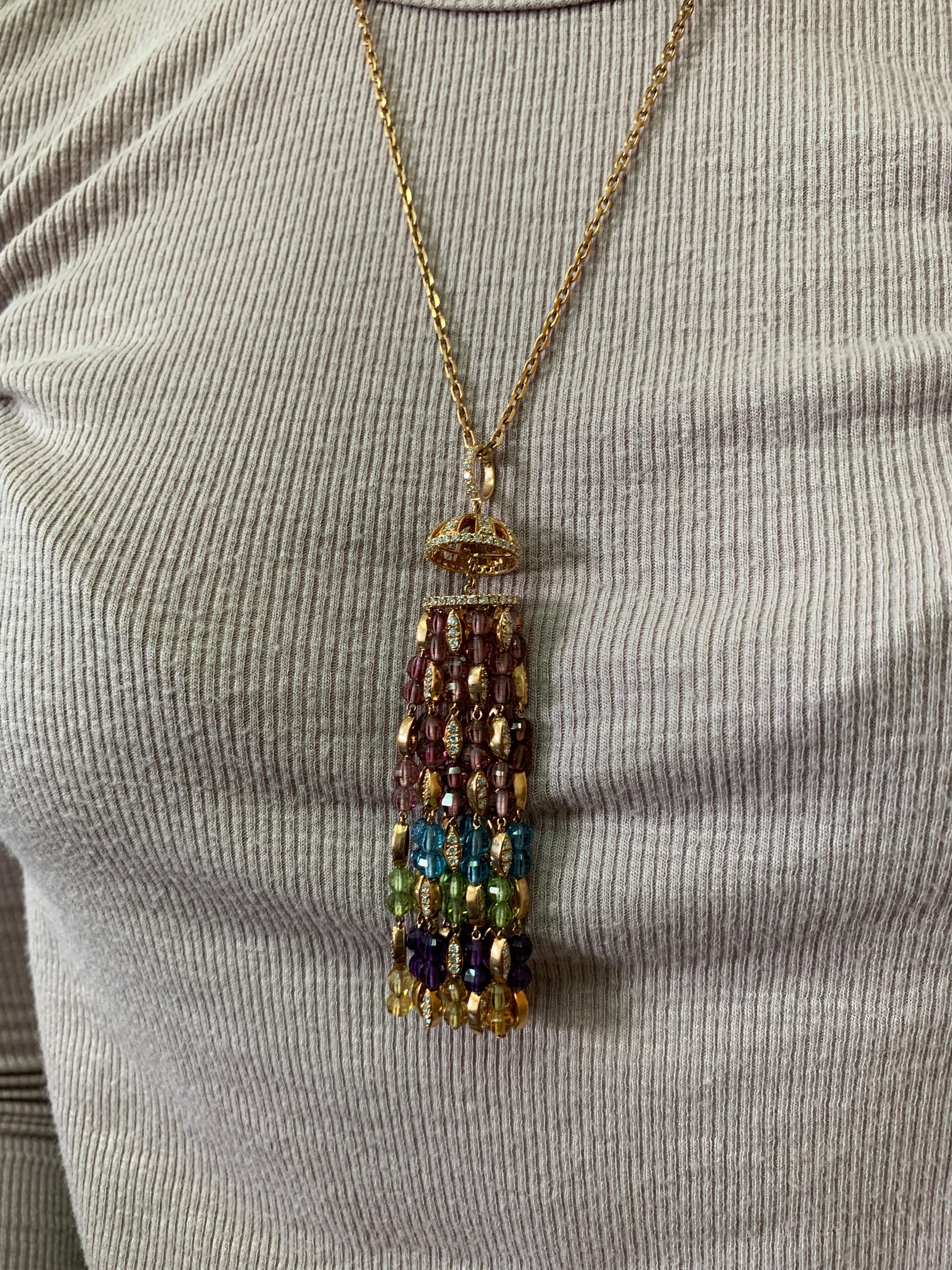 In honor of #PrideMonth, Sunita presents a rainbow beaded necklace which elegantly dangles. In support of love, equality and unity, Sunita uses various color gemstones to bring forward a rainbow effect. This is a light and fun drop necklace with a
