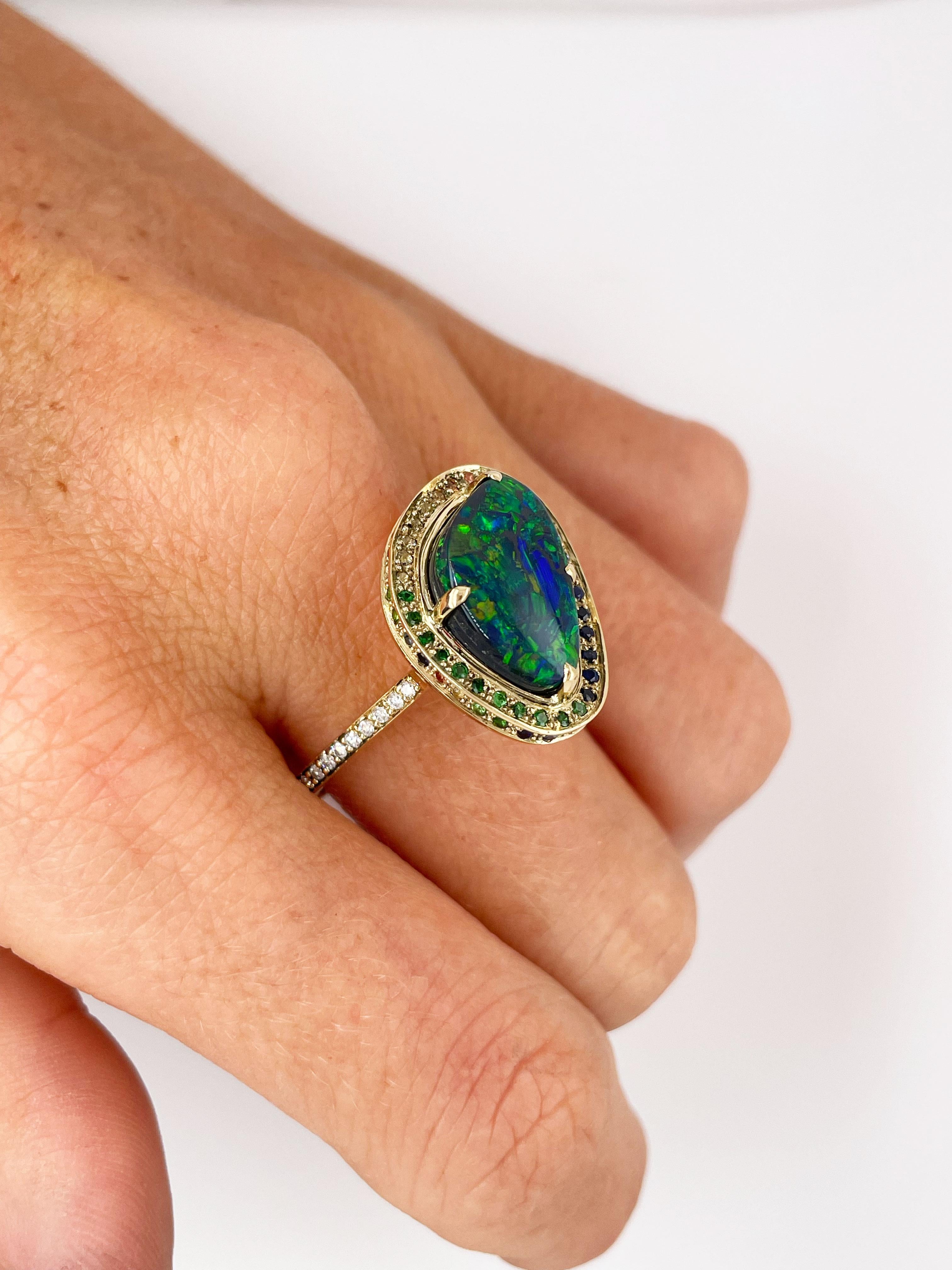 For Sale:  Rainbow Black Australian Opal Ring with Sapphires and 18ct Yellow Gold 9