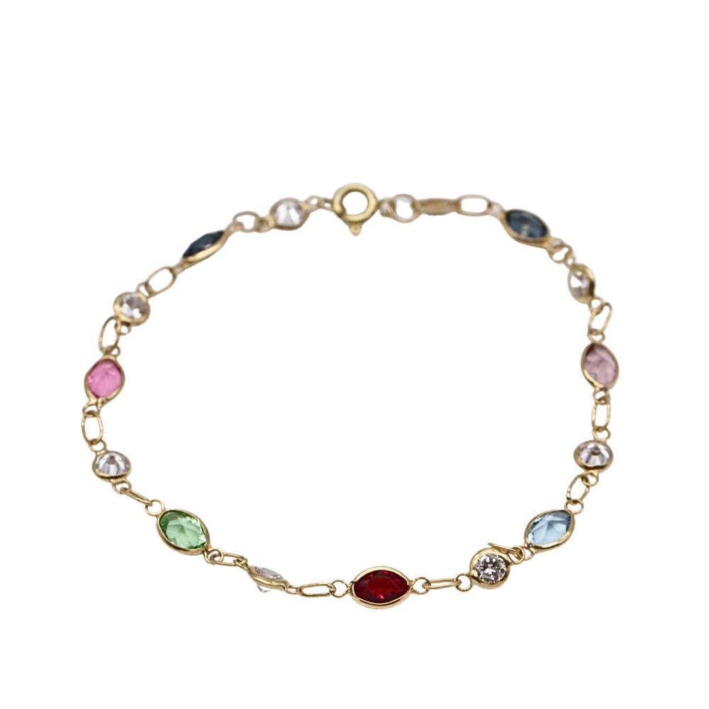 Color Bracelet for Women  Tourmaline, Amethyst, and Sapphire with 4x Zirconia  18K Yellow Gold  2.70 grams  Length: 19.5 cm  Spring Ring Clasp  Brand New  Ref: D364315CH

Embrace the beauty of vibrant color with this elegant multistone link