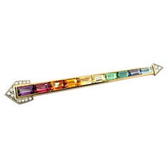 Broche Arco Iris con Amatista, Citrino y Aguamarina en Oro Amarillo de 18 Kilates