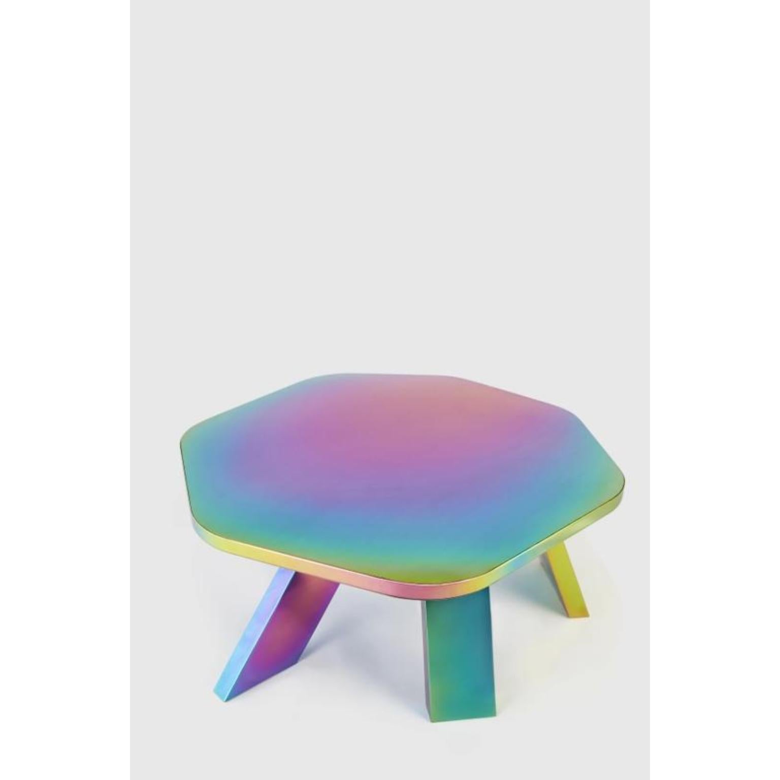 Rainbow center table by Hatsu
Dimensions: D 114 x W 127 x H 40 cm 
Materials: Plated stainless steel 

Hatsu is a design studio based in Mumbai that creates modern lighting that are unique and immediately recognisable. We started with an idea to