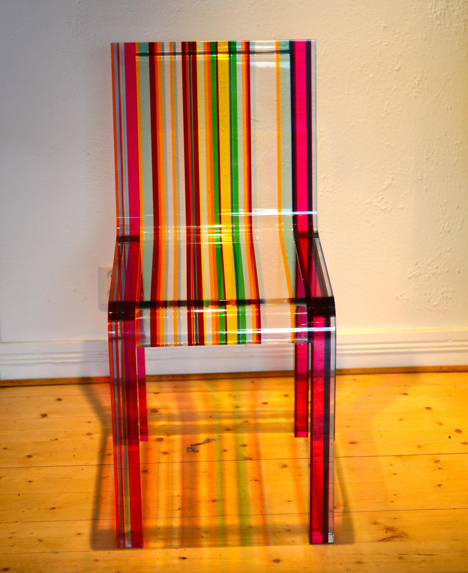 Chair entirely manufactured in acrylic resin, made of plates of different color and thickness joined by ultrasounds. Designed by French designer Patrick Norguet and produced by Cappellini.